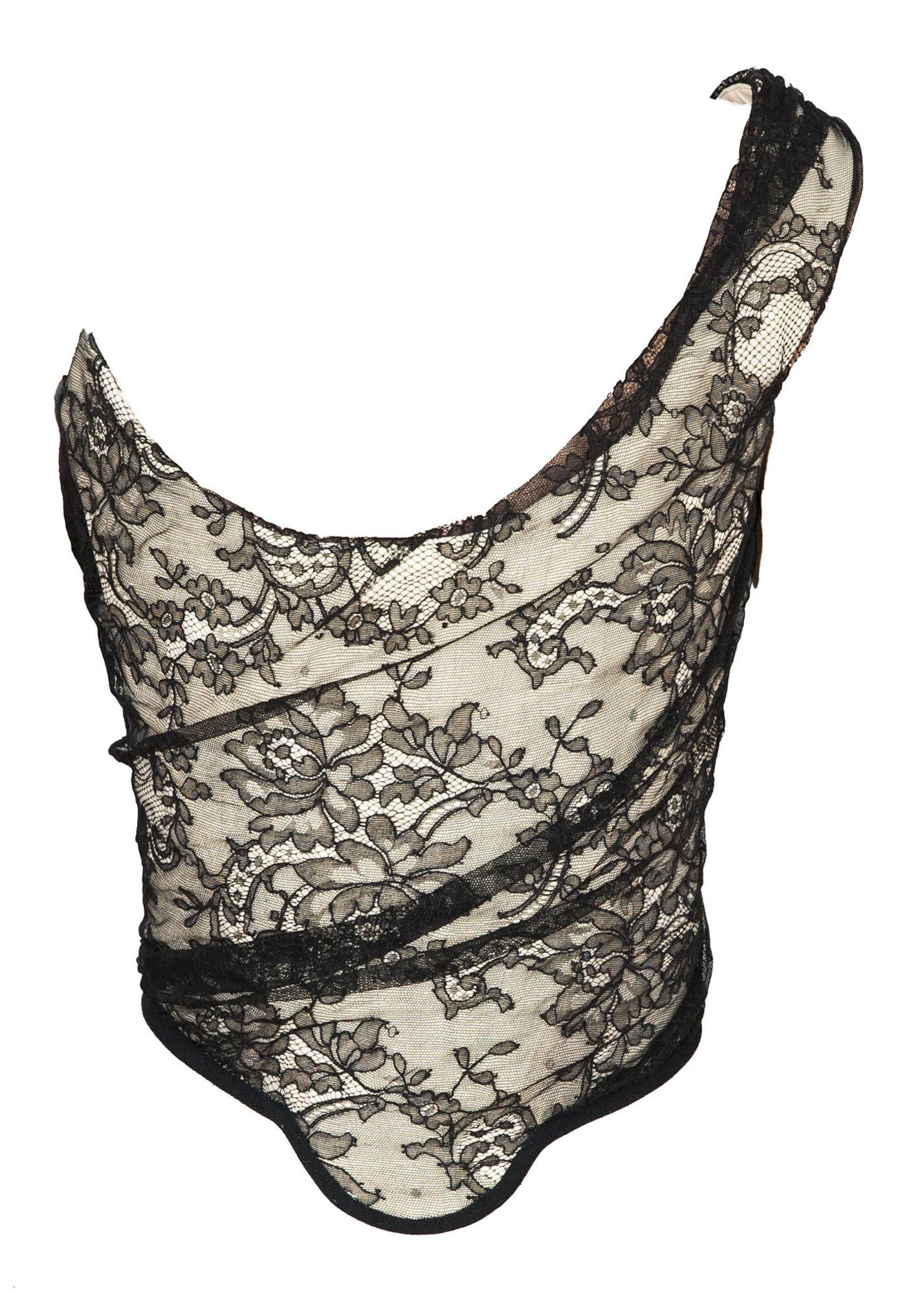 Vivienne Westwood BLACK LACE CORSET Description: Fitted mono shoulder corset....