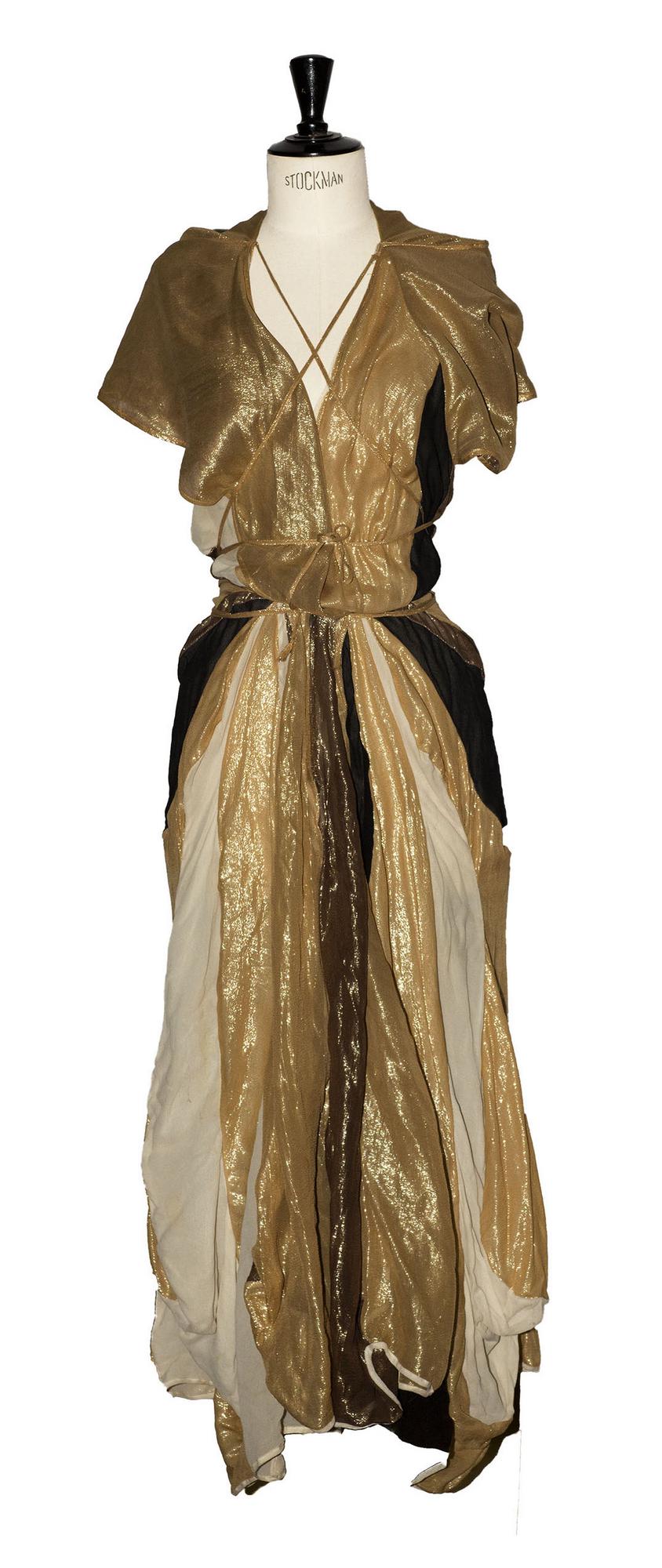 Vivienne Westwood WHEEL DRESS Description: Open back dress, with a wide skirt...
