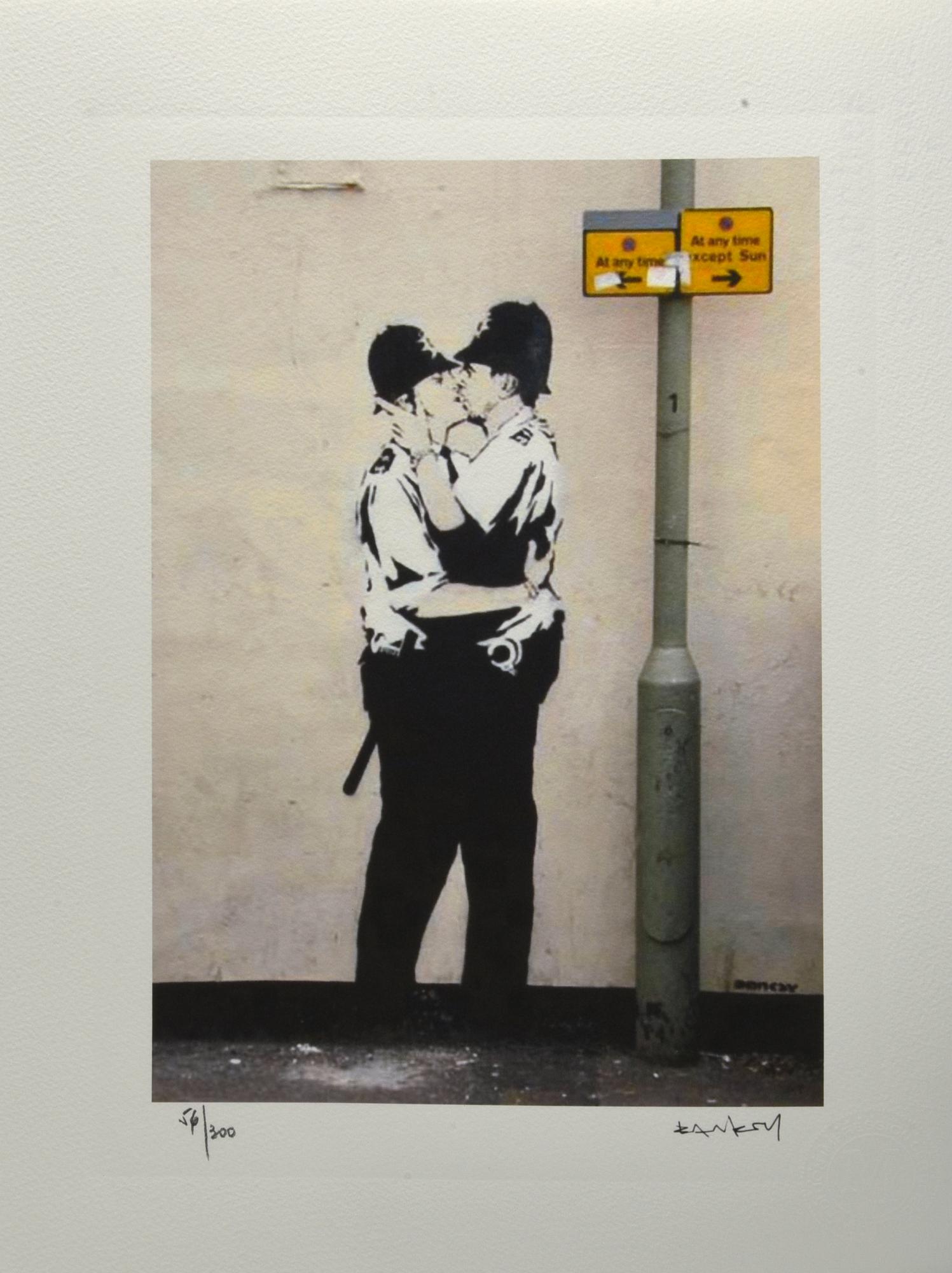 Da Banksy KISSING COPPERS eliografia su carta Arches, cm 38x28,5; es. 56/300...