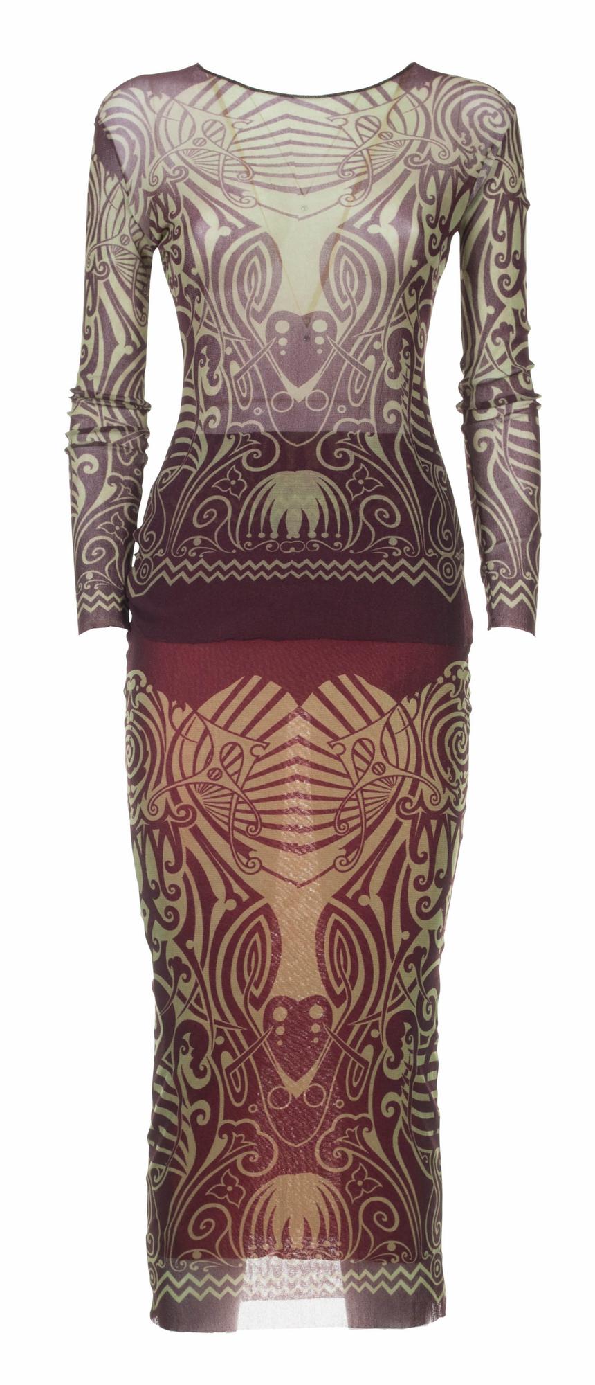 Jean Paul Gaultier ICONIC TATTOO MESH SUIT DESCRIPTION: Iconic burgundy and...