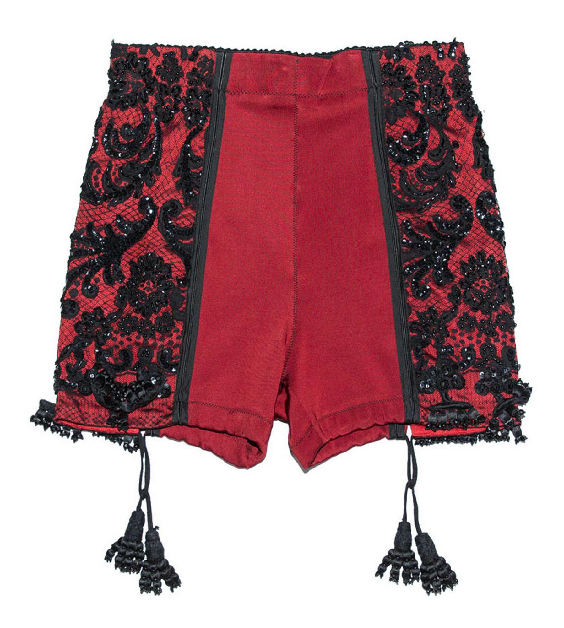 Jean Paul Gaultier LACE SHORTS Description: Shorts in red elastic fabric with...