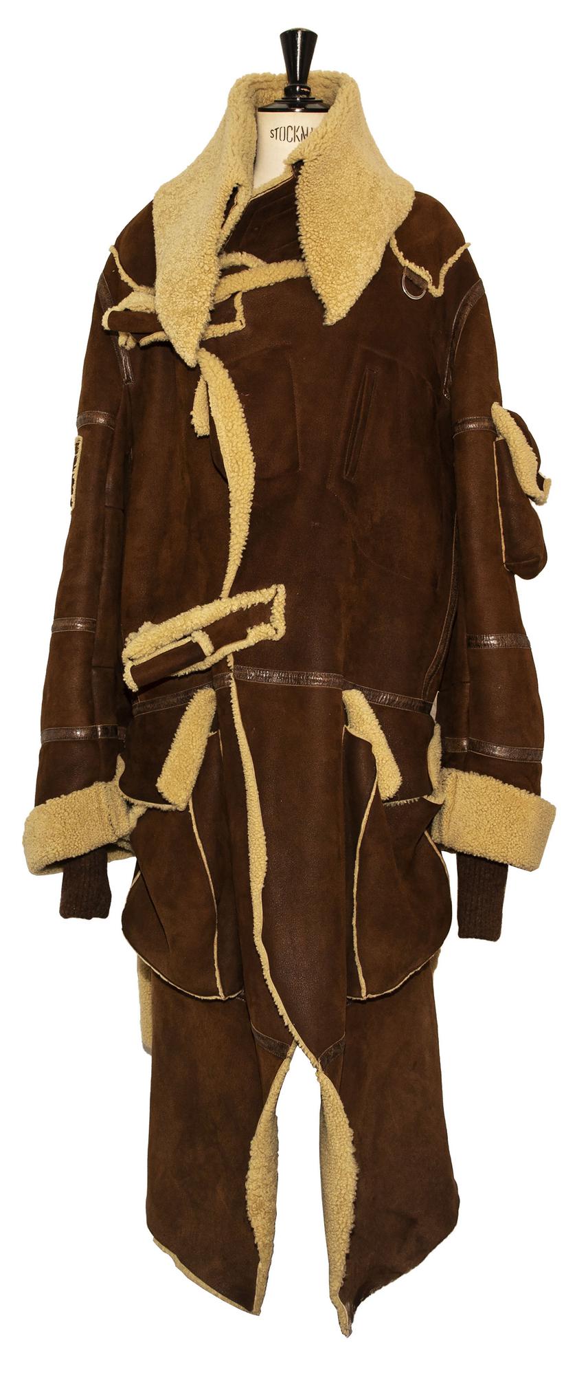 John Galliano SHEEPSKIN COAT Description: Reverse sheepskin coat, patch...