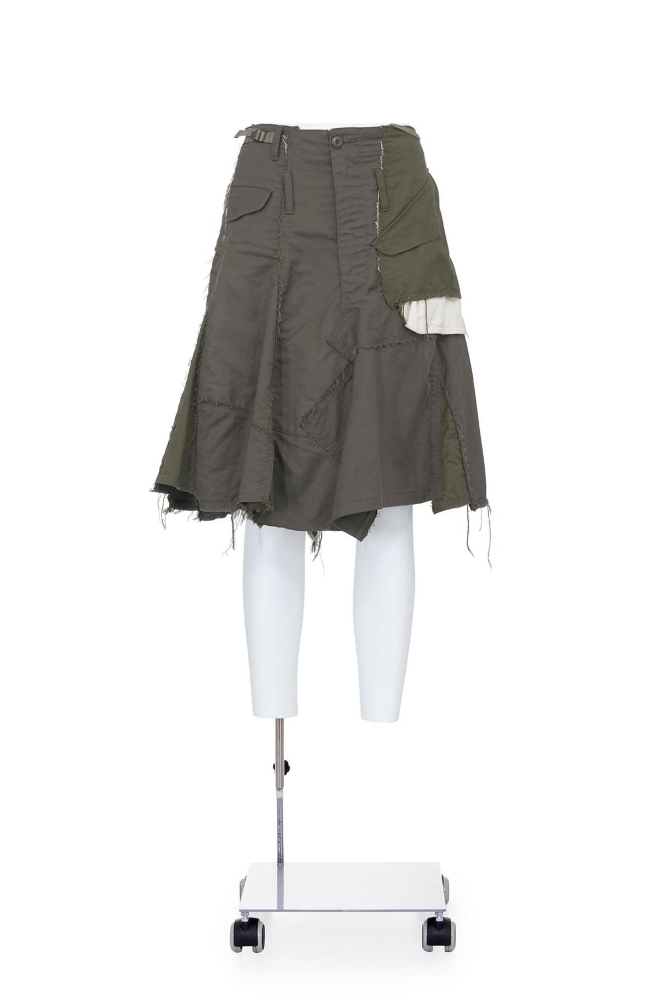 JUNYA WATANABE Iconic military patchwork flared skirt DESCRIPTION: Iconic...