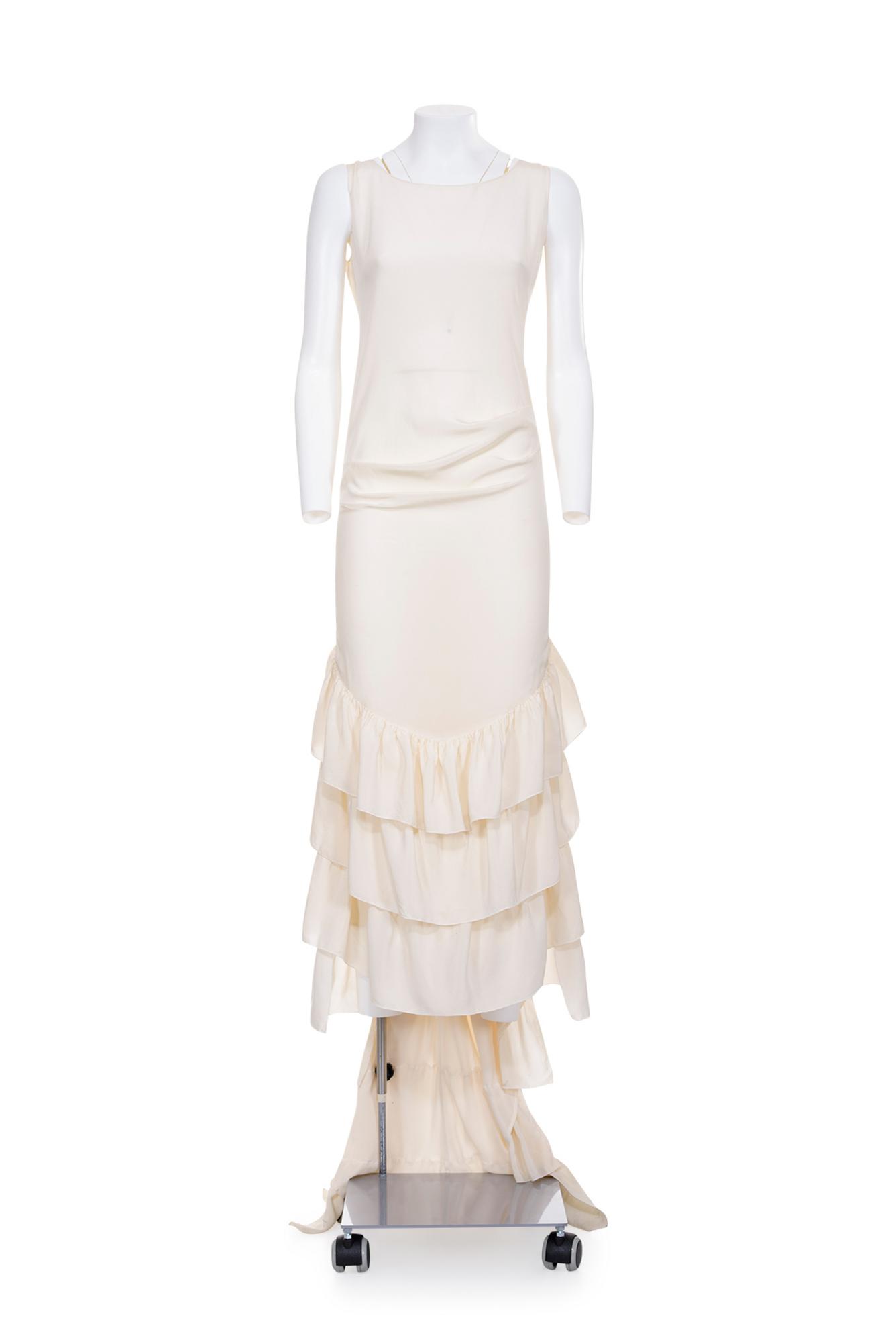 ALEXANDER McQUEEN Rare silk dress DESCRIPTION: Rare offwhite silk dress with...