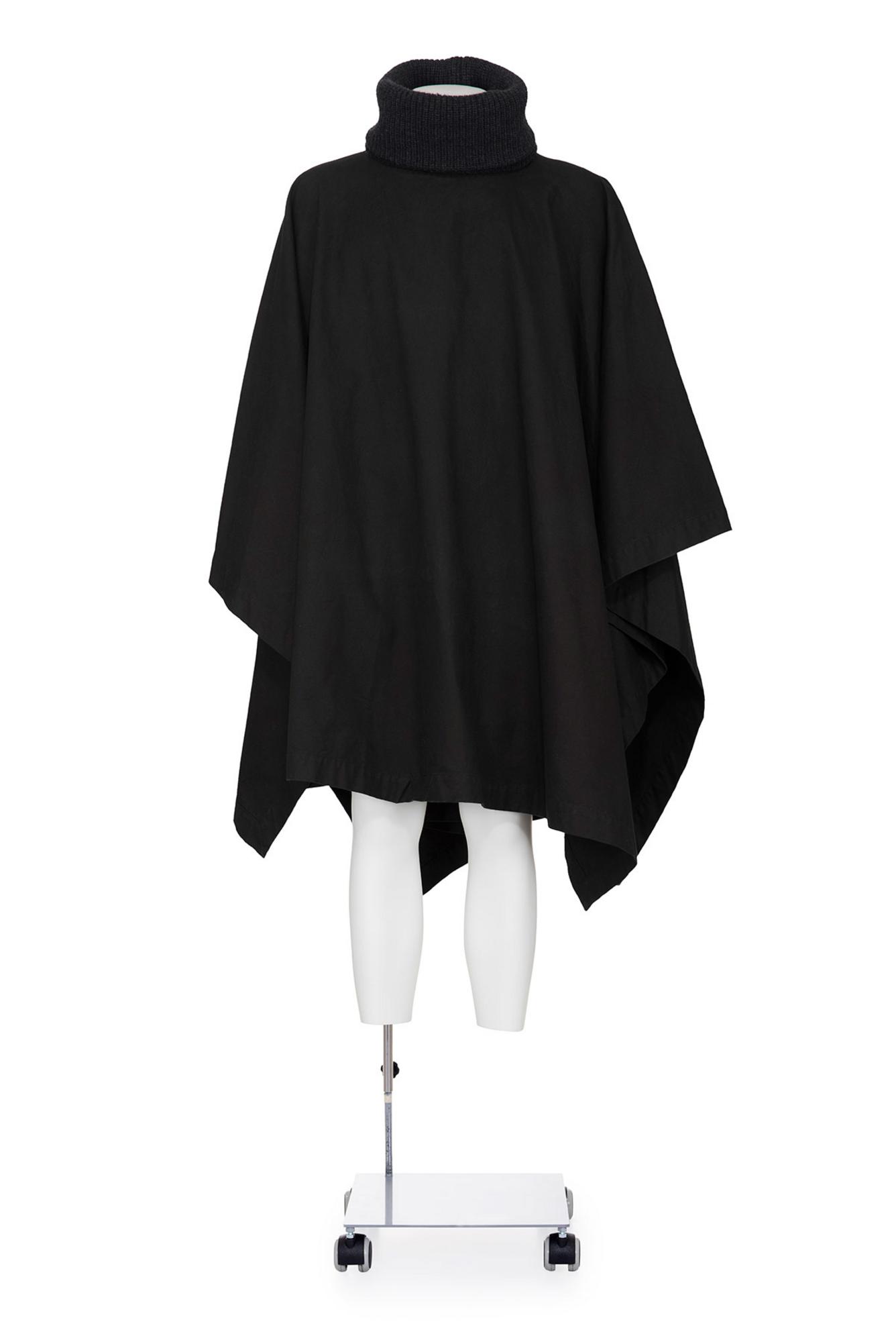 RAF SIMONS Rare and iconic cape DESCRIPTION: Rare and iconic black cape with...