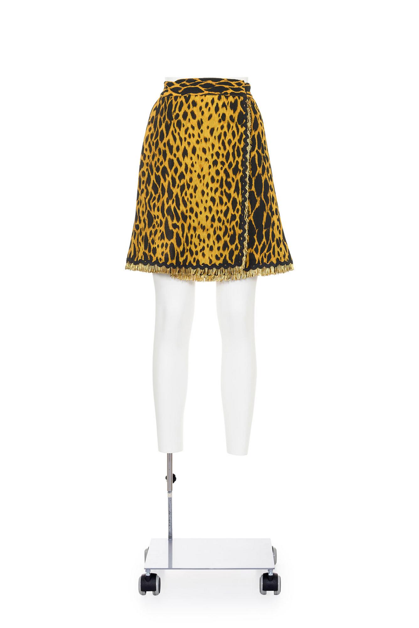 GIANNI VERSACE Iconic folded animalier skirt DESCRIPTION: Iconic yellow and...