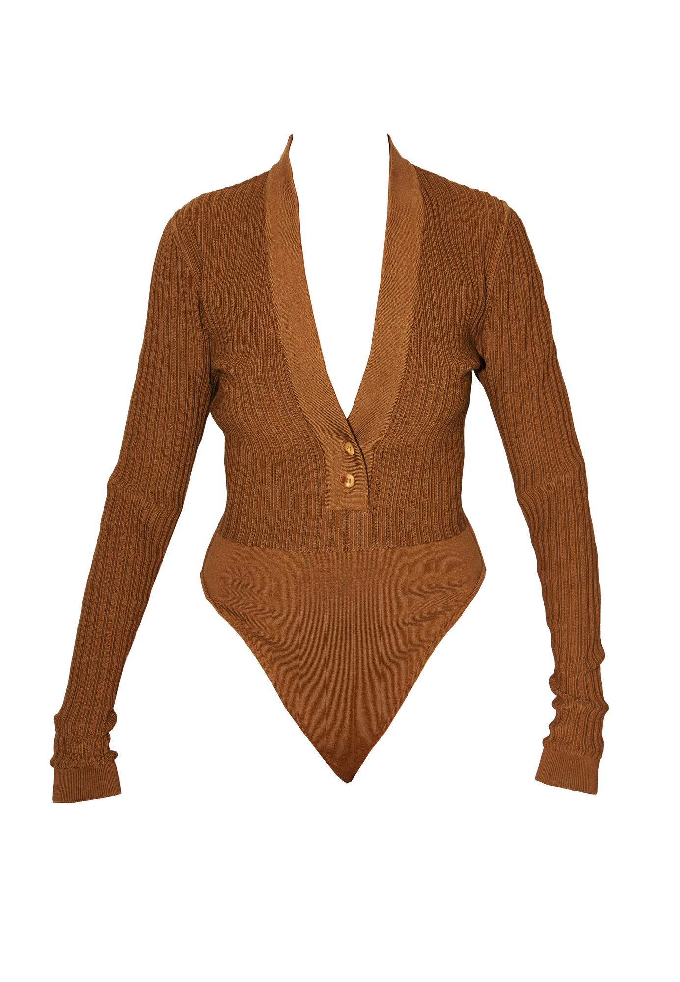 Azzedine Alaia BODY Description: Body in stretch wool fabric with ribbed...