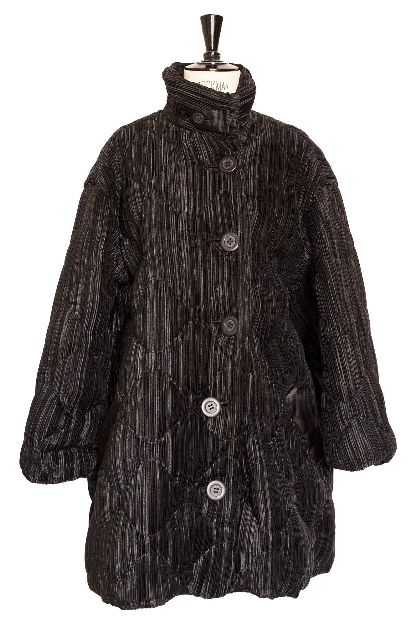 Issey Miyake DIAMOND PEA COAT Description: Pea coat made of pleated black...