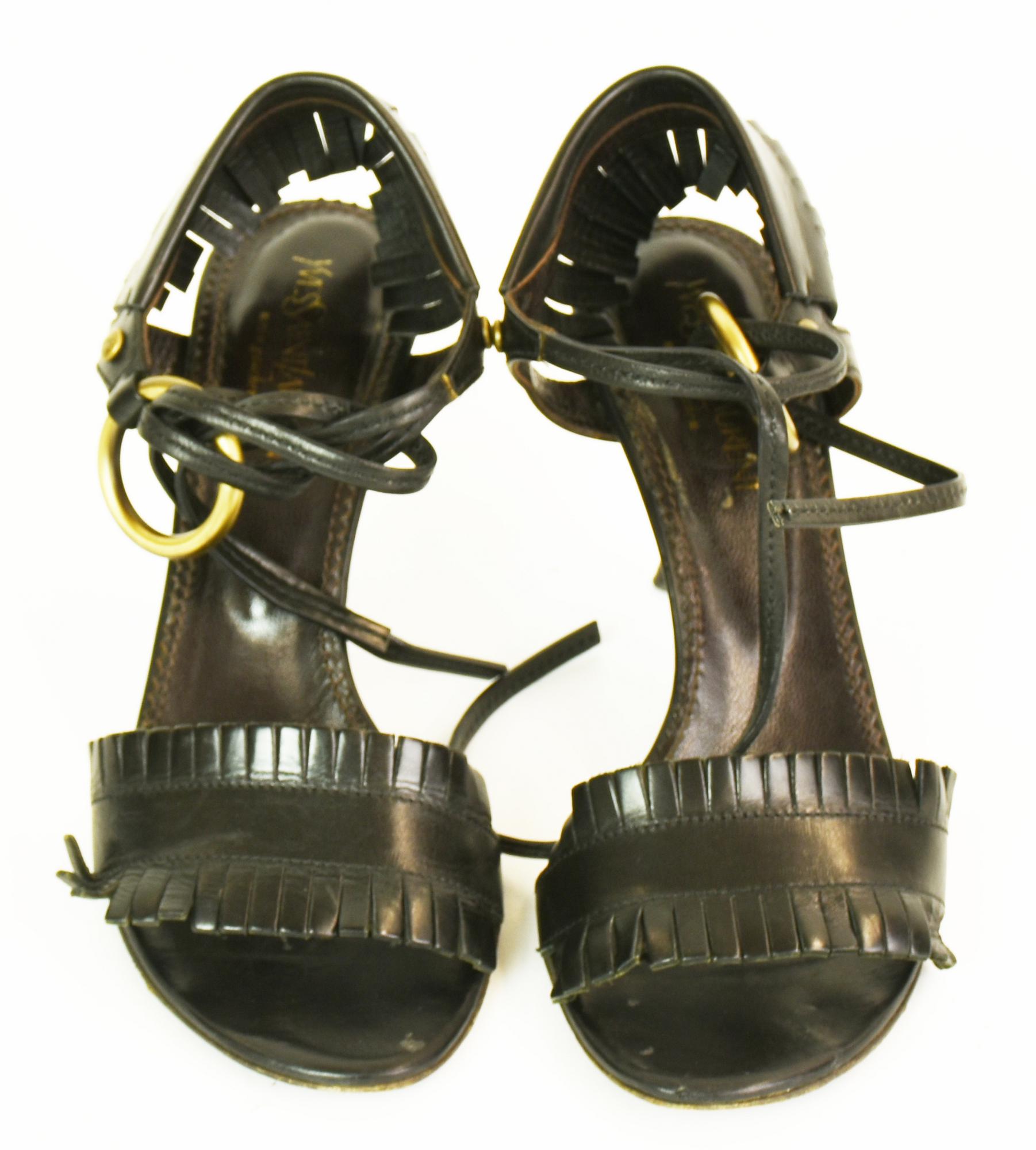 Yves Saint Laurent Rive Gauche SANDALS Description : Sandals in black leather...