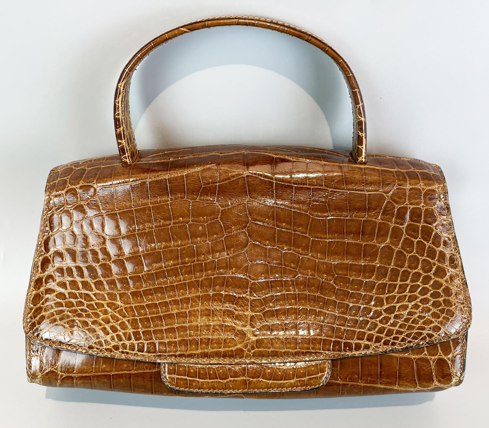 Valextra CROCODILE HANDBAG Description: Crocodile handbag with interior...