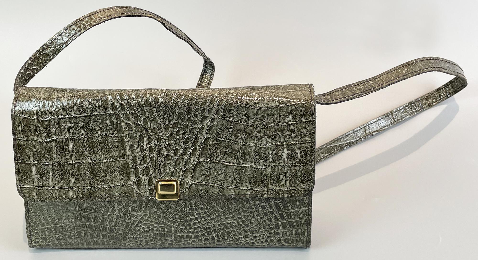 CROCODILE BAG Description: Olive green crocodile bag. Removable strap. No...