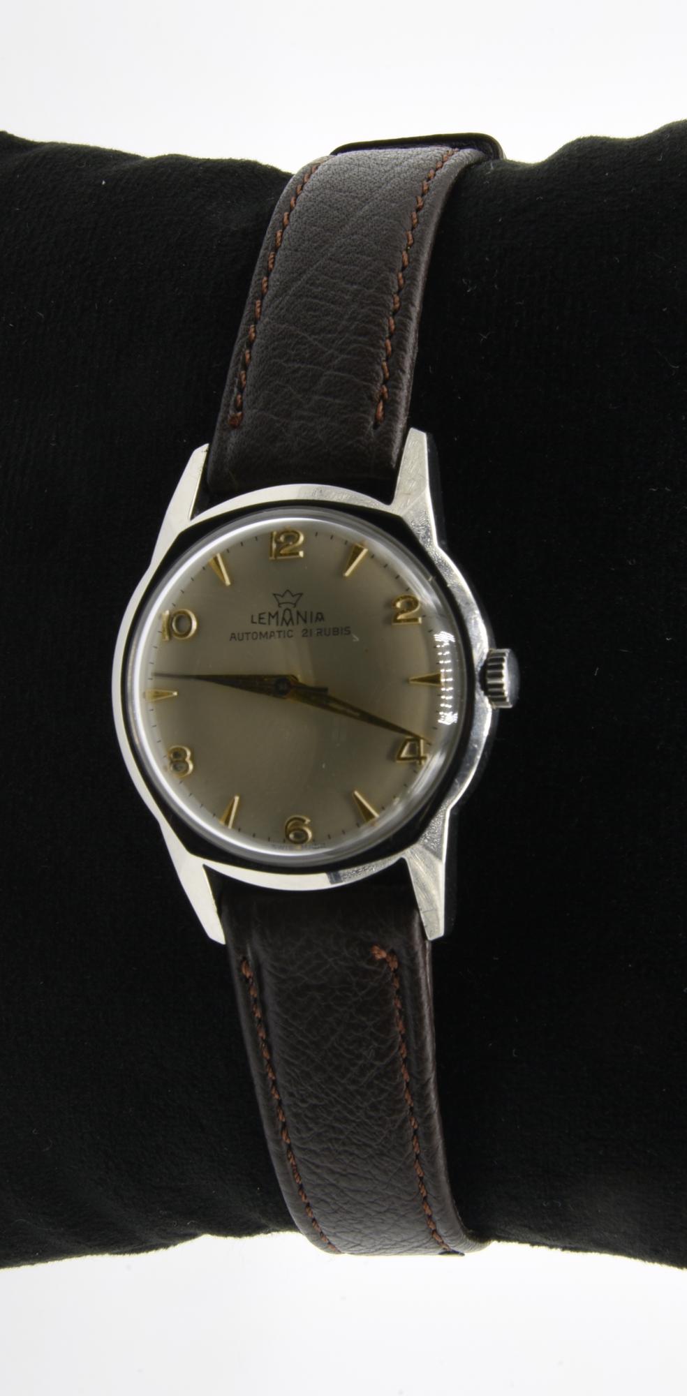 OROLOGIO DA POLSO LEMANIA, anni '50 CASSA: in acciao QUADRANTE: champagne con...