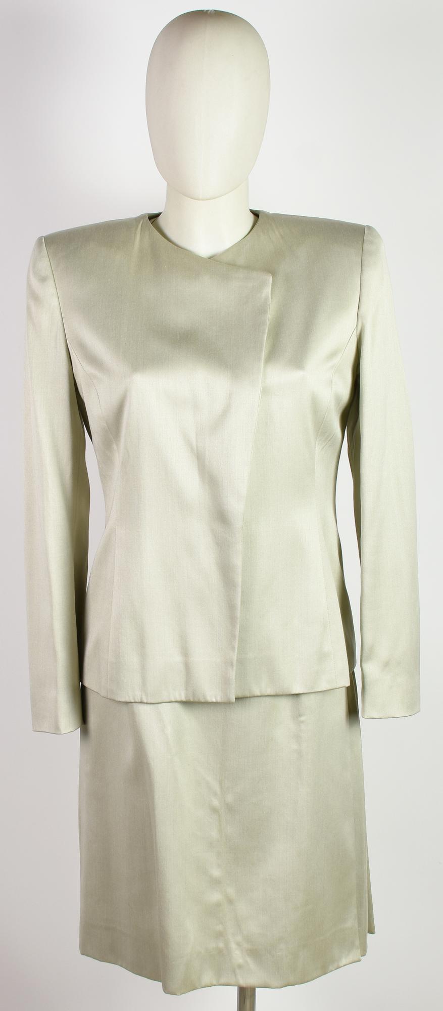 Celine SUIT DESCRIPTION: Suit consisting of a sheath dress and jacket....