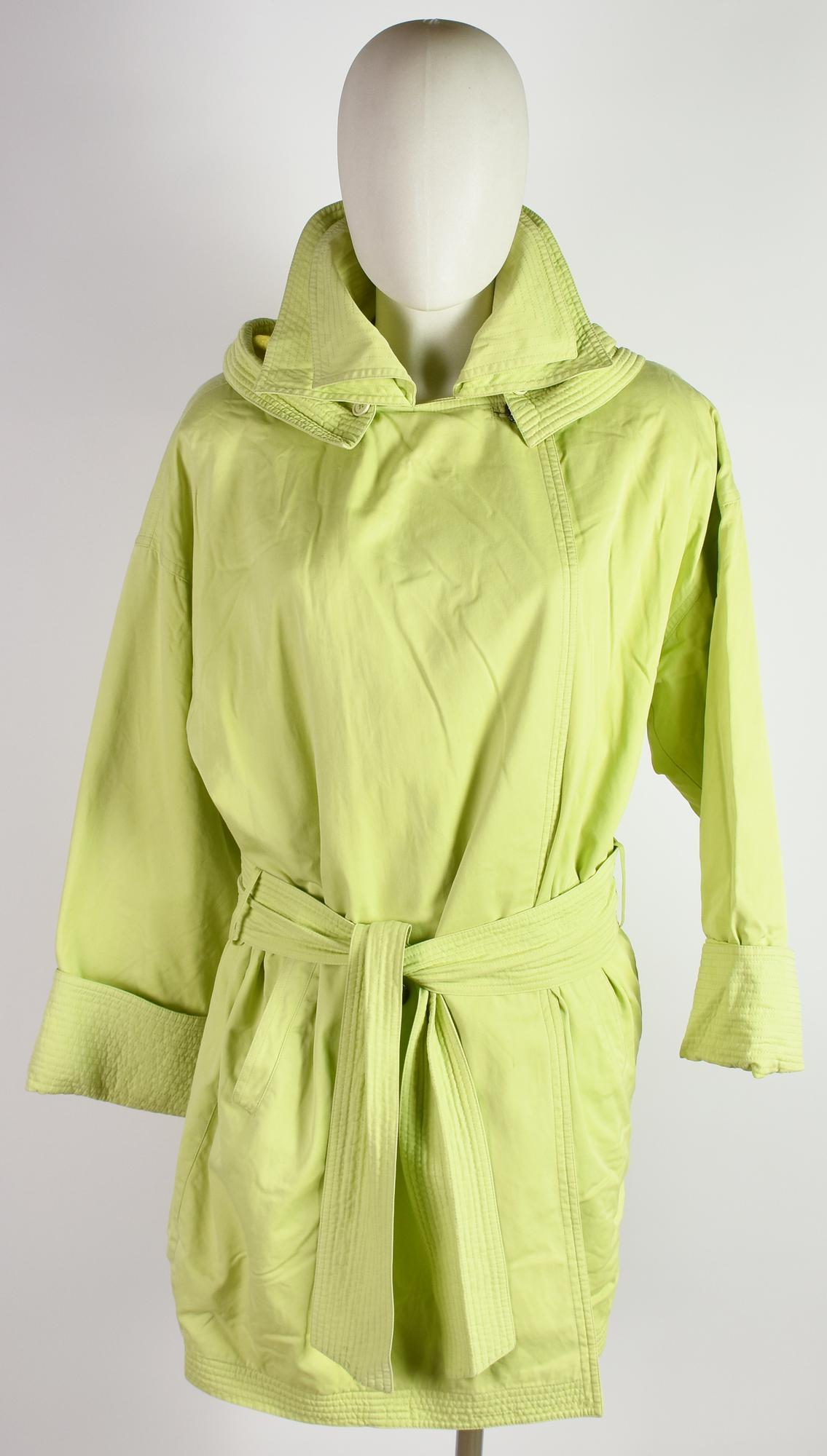 Gianni Versace GREEN COAT DESCRIPTION: Women's green raincoat-style...