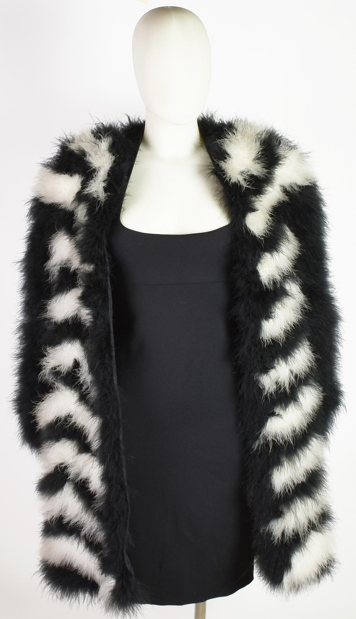 MARABOU FUR DESCRIPTION: White and black marabou fur. Missing size and...