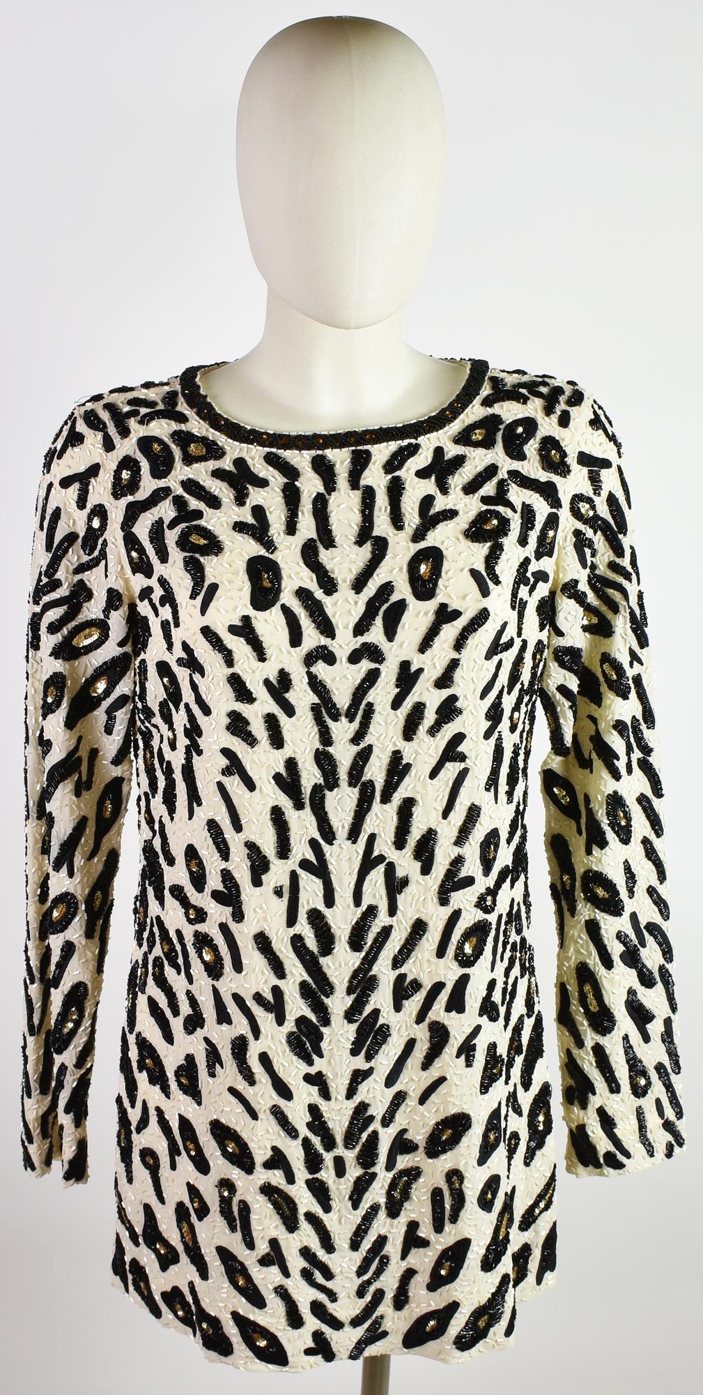 Marciano SHORT DRESS DESCRIPTION: Short dress with long sleeves and animal...