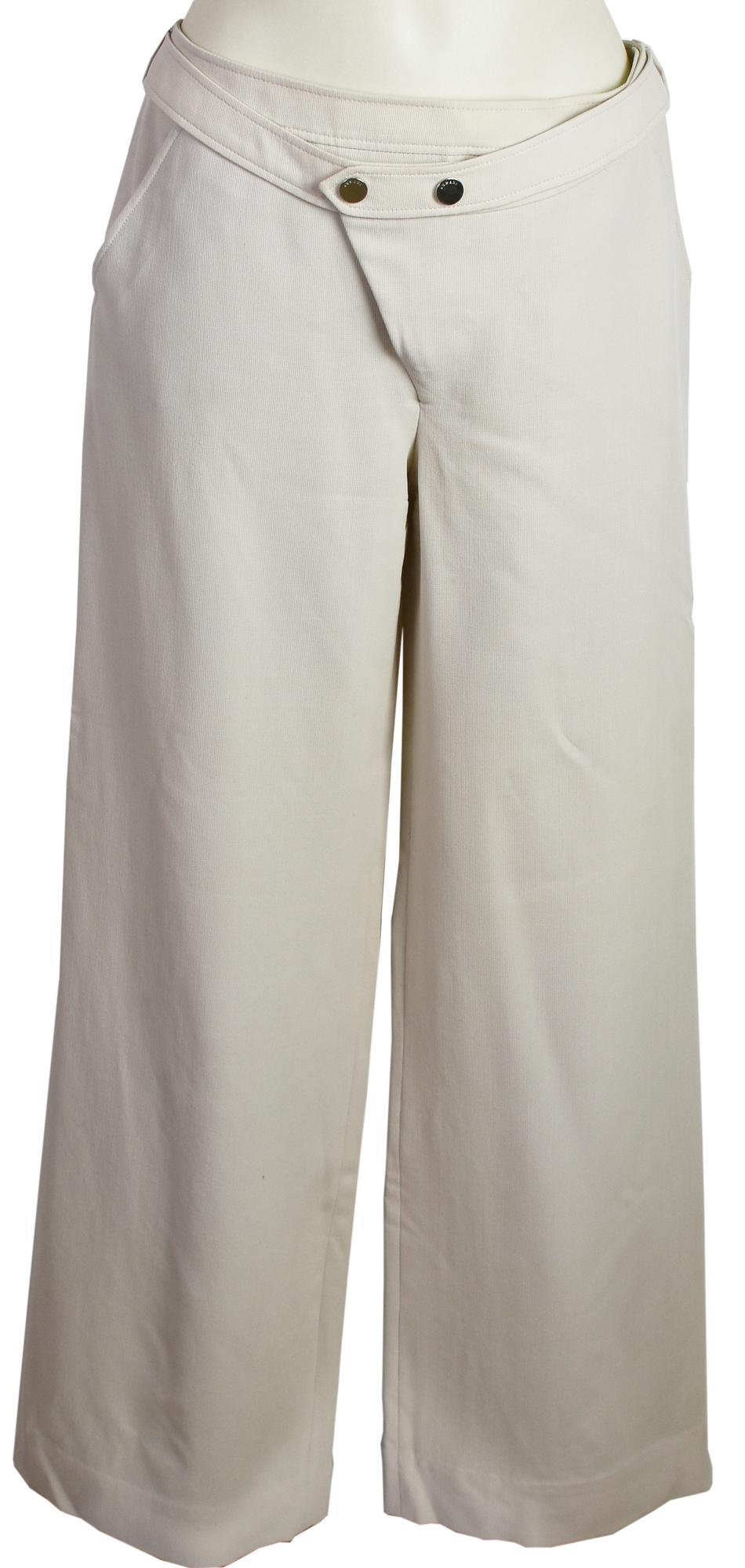 Armani Collezioni TROUSERS DESCRIPTION: Wide-leg corduroy trousers lined in...