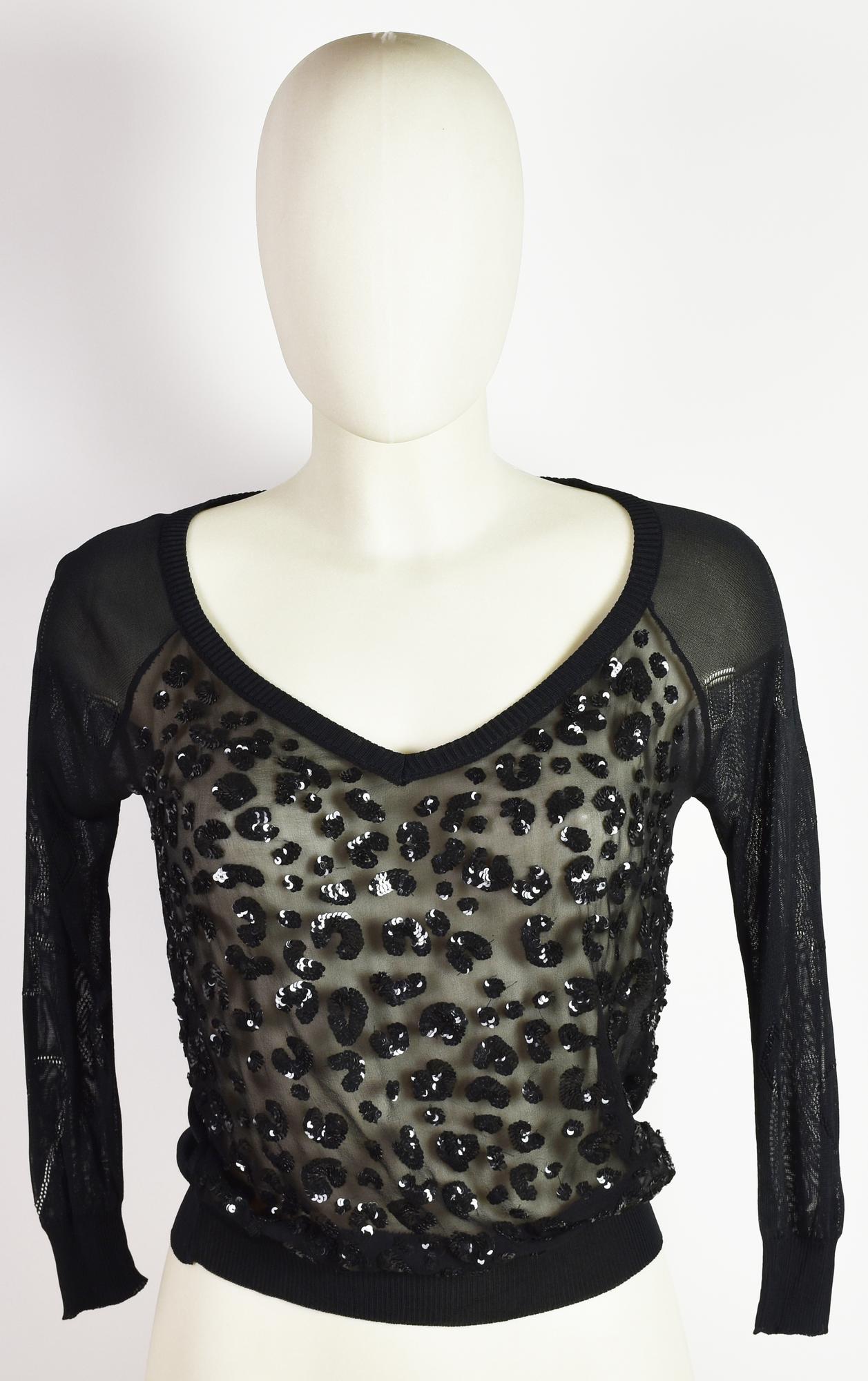 John Richmond TOP DESCRIPTION: Sheer V-neck sweater. Features animal print...