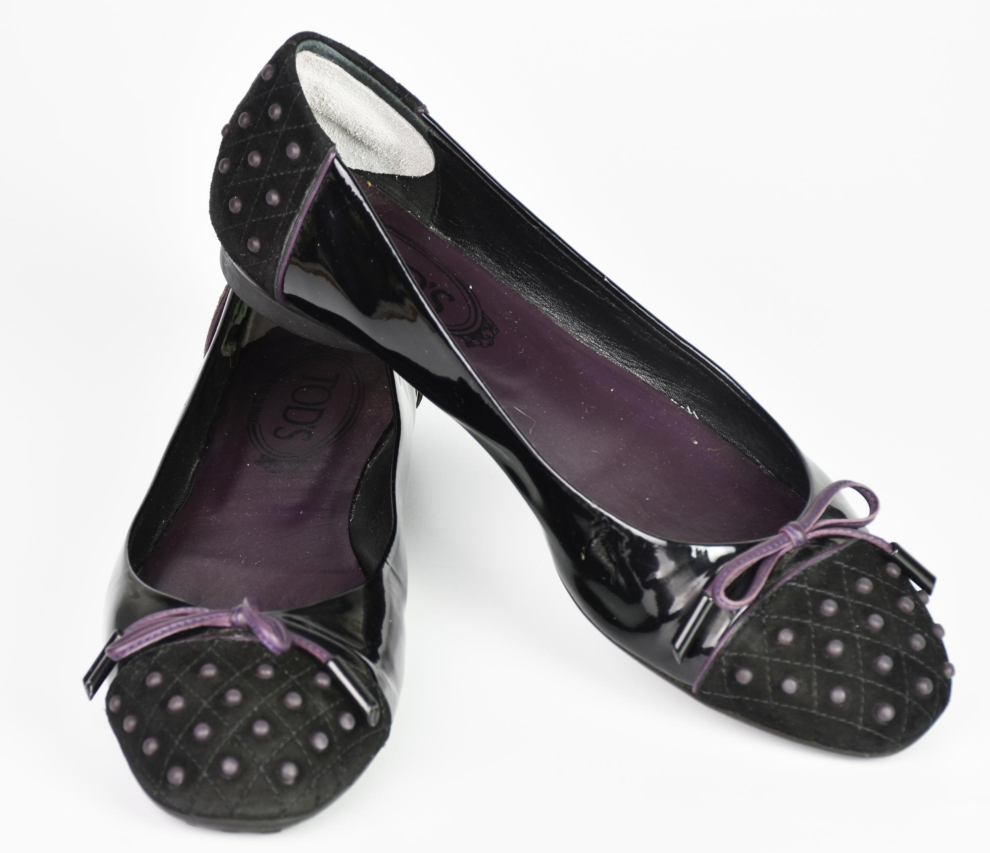 Tod's BALLET FLATS DESCRIPTION: Black patent leather ballerina flats with...