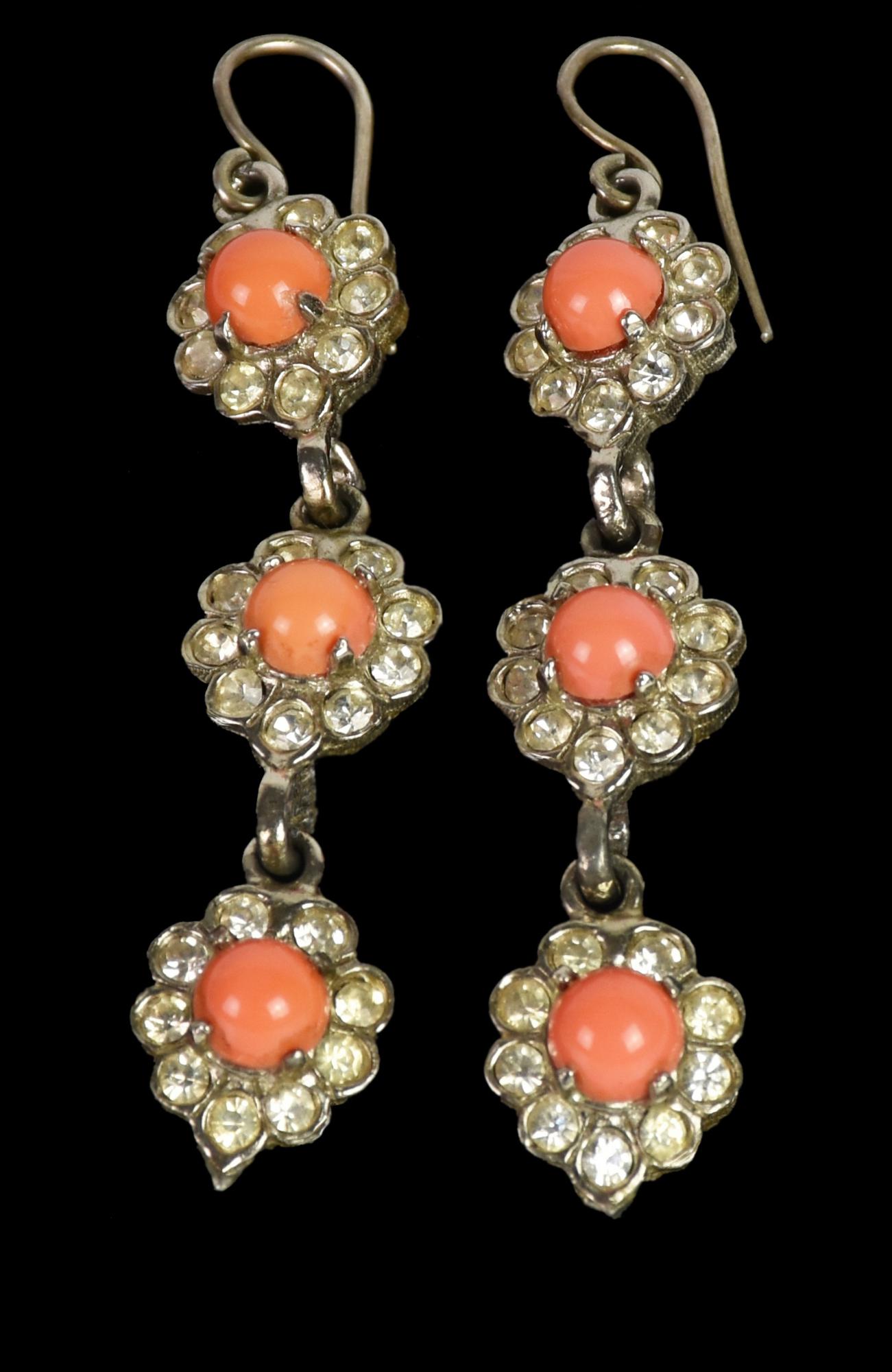 Kanneth Jane Lane EARRINGS DESCRIPTION: Earrings with coral colored glass and...