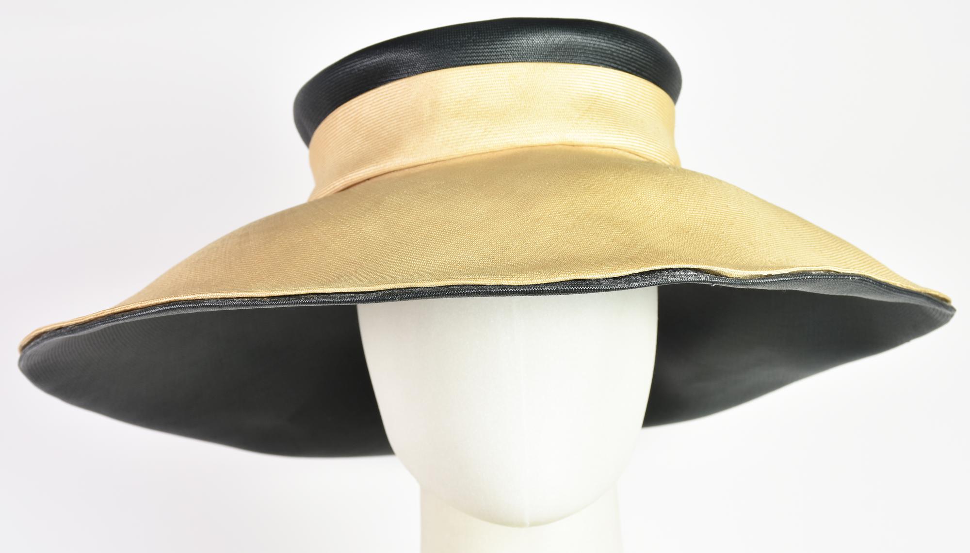 Jean Patou WIDE-BRIMMED HAT DESCRIPTION: Wide-brimmed hat in cream and black...