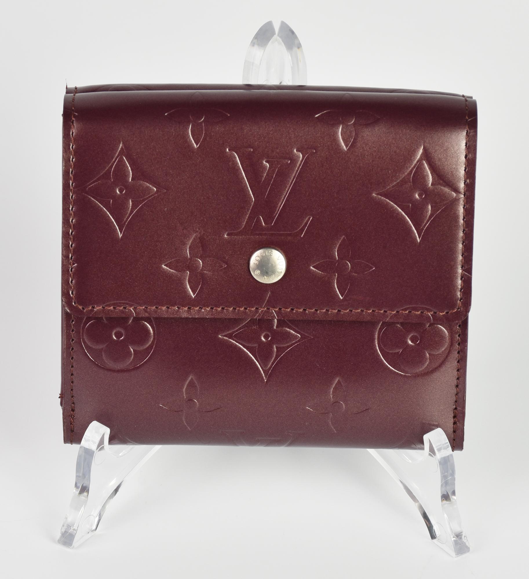 Louis Vuitton BURGUNDY MONOGRAM MAT WALLET BI-FOLD DESCRIPTION: Bifold wallet...