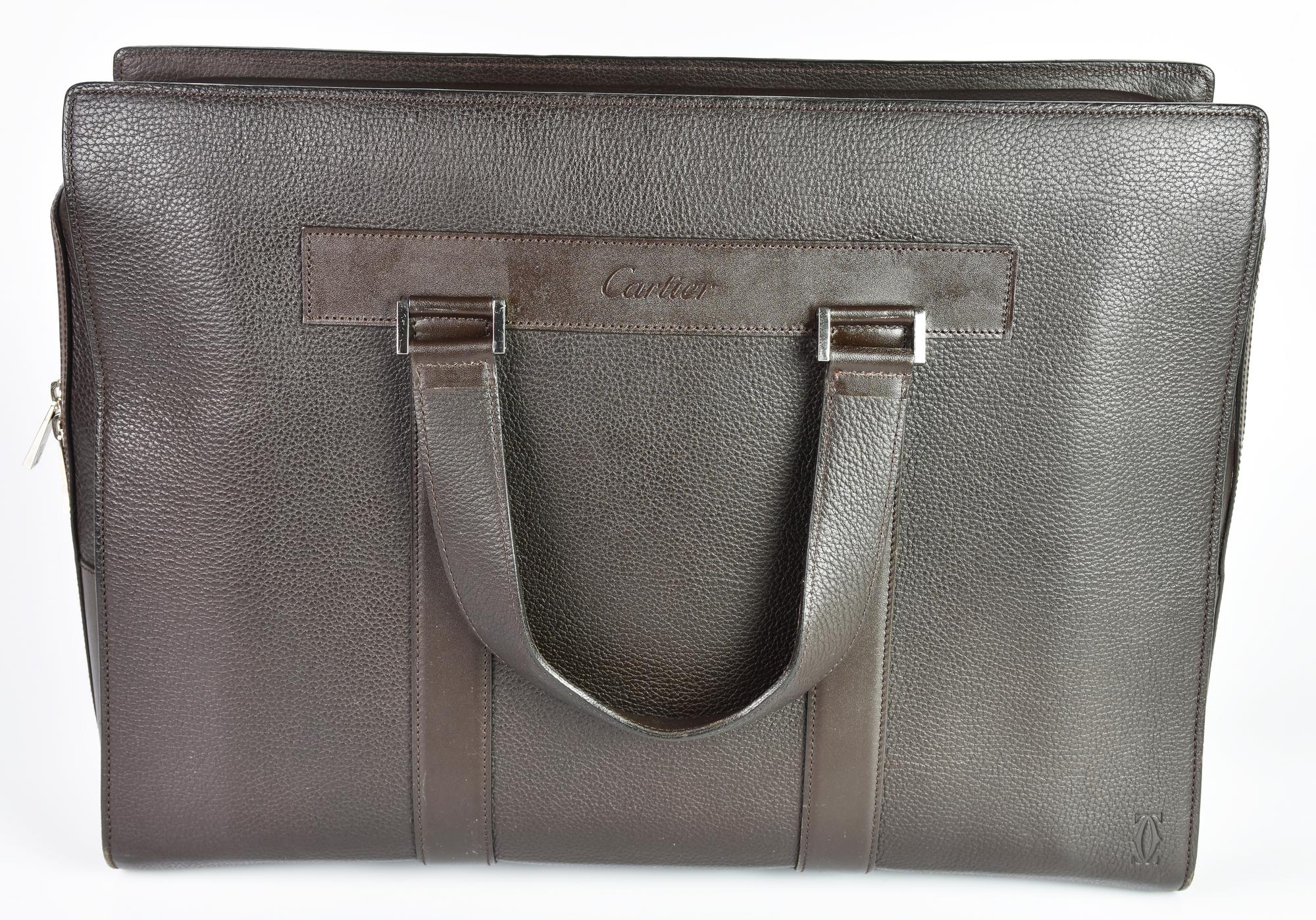 Cartier PASHA BRIEFCASE DESCRIPTION: Two-handle dark brown leather briefcase....