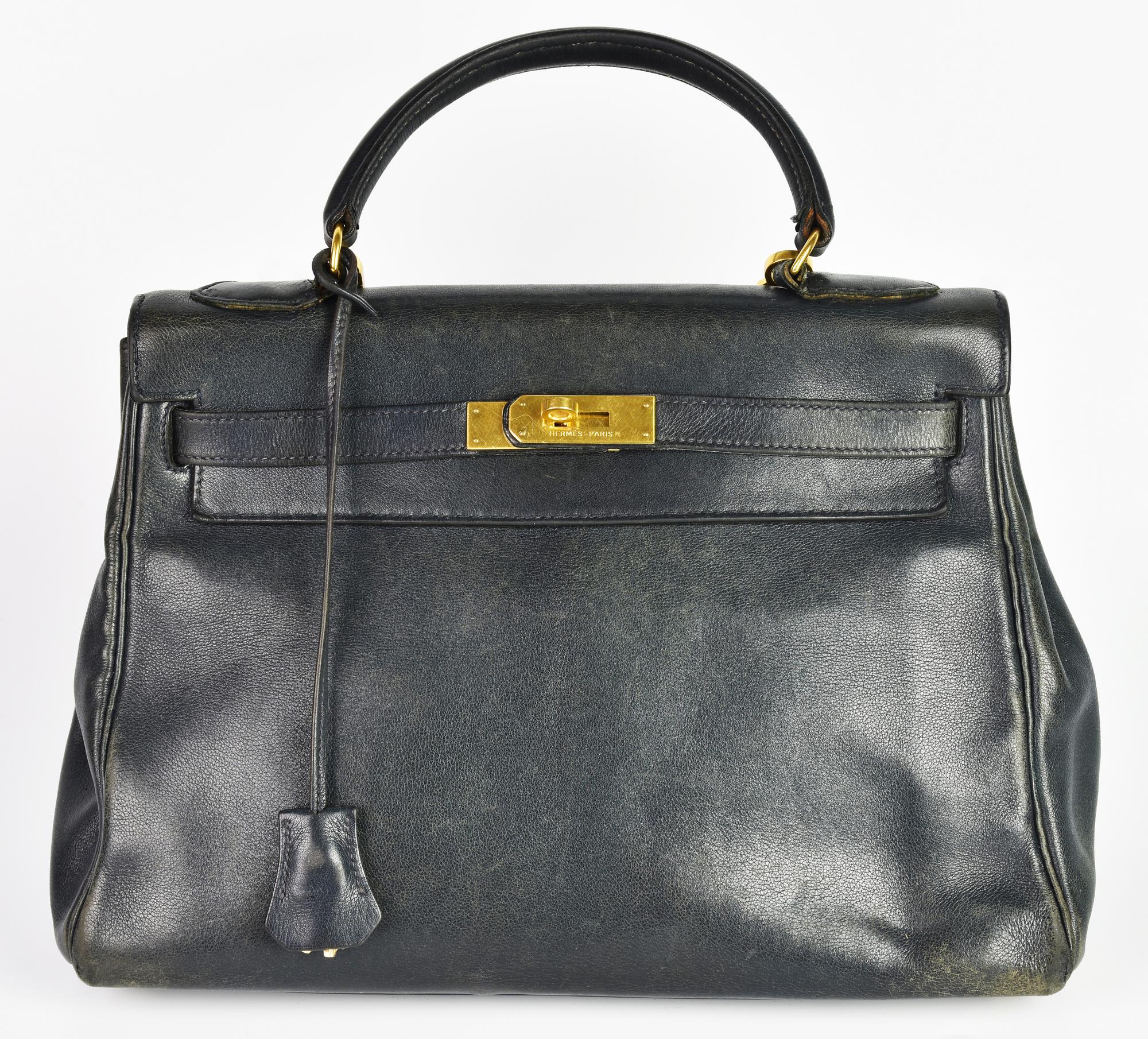 Hermes KELLY 32 DESCRIPTION: Kelly Rebourne bag in midnight blue leather....