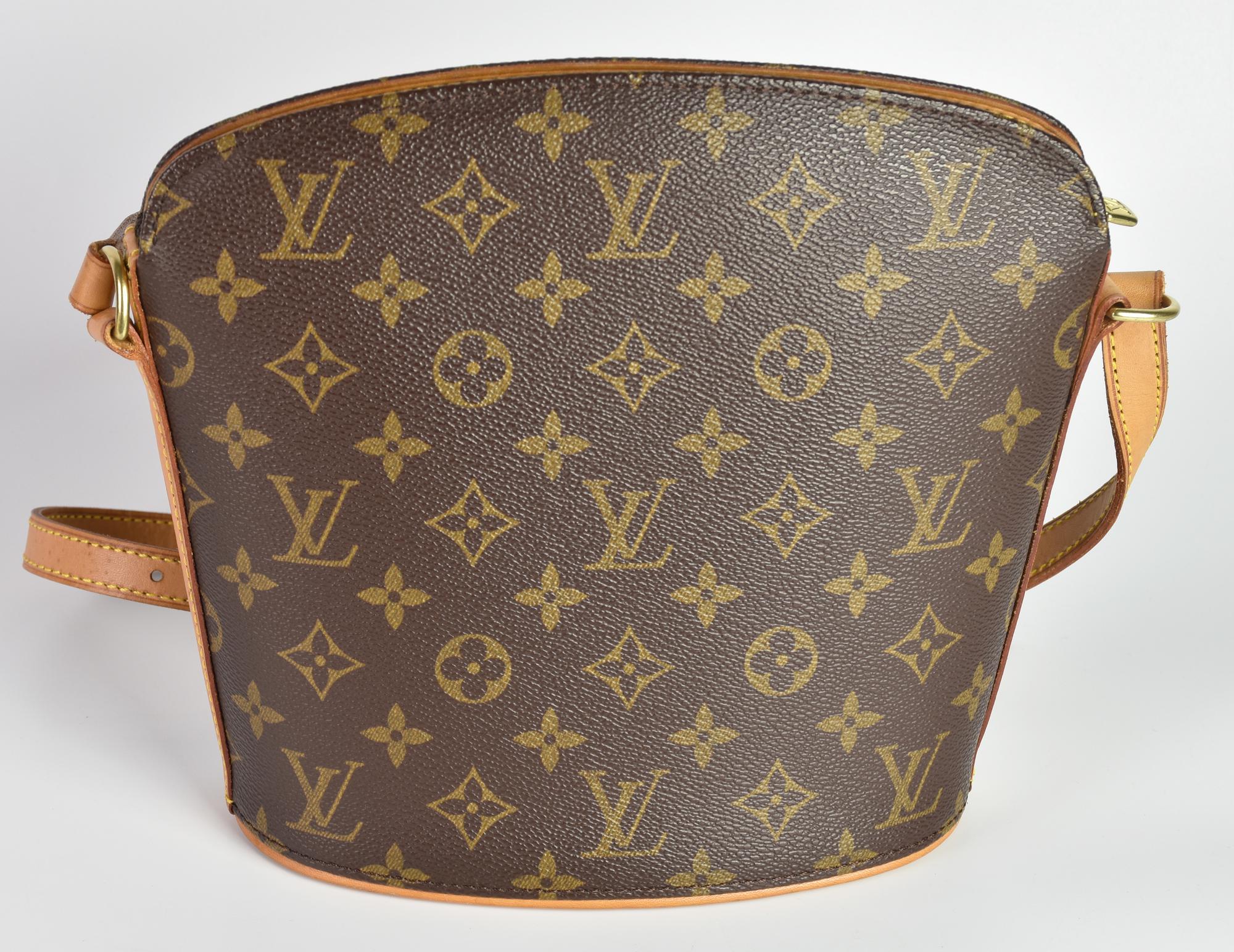 Louis Vuitton MONOGRAM SHOULDER BAG DROUOT DESCRIPTION: Bucket bag with...