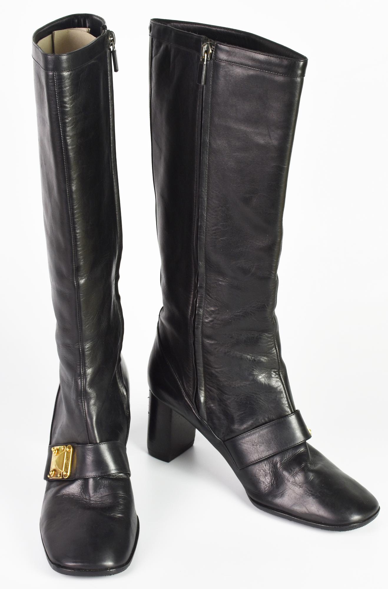 Louis Vuitton LEATHER BOOTS DESCRIPTION: Black leather boots with a...