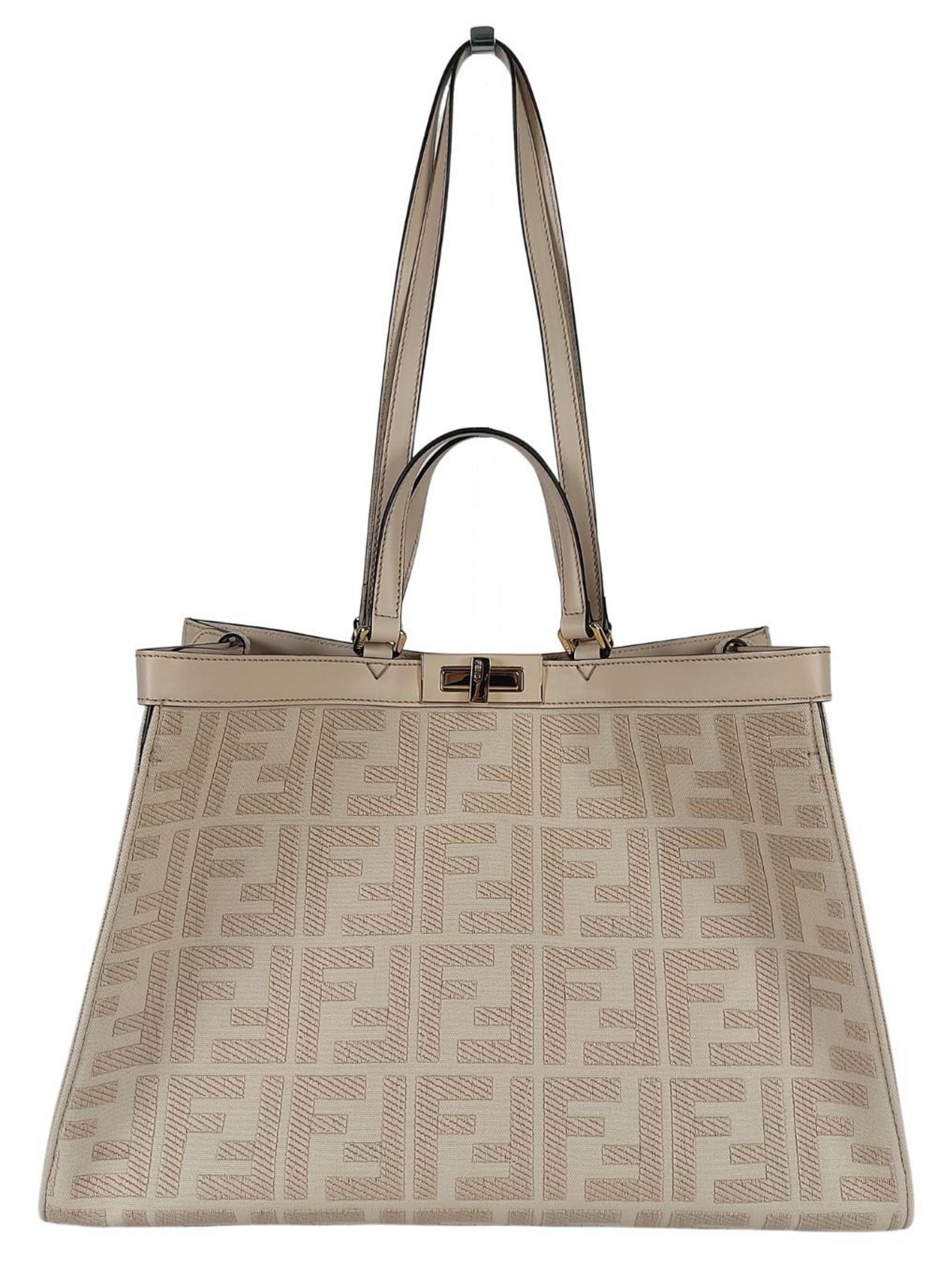 Fendi BORSA A SPALLA PEEKABOO TOTE MEDIUM DESCRIPTION: Two-way tote bag, with...