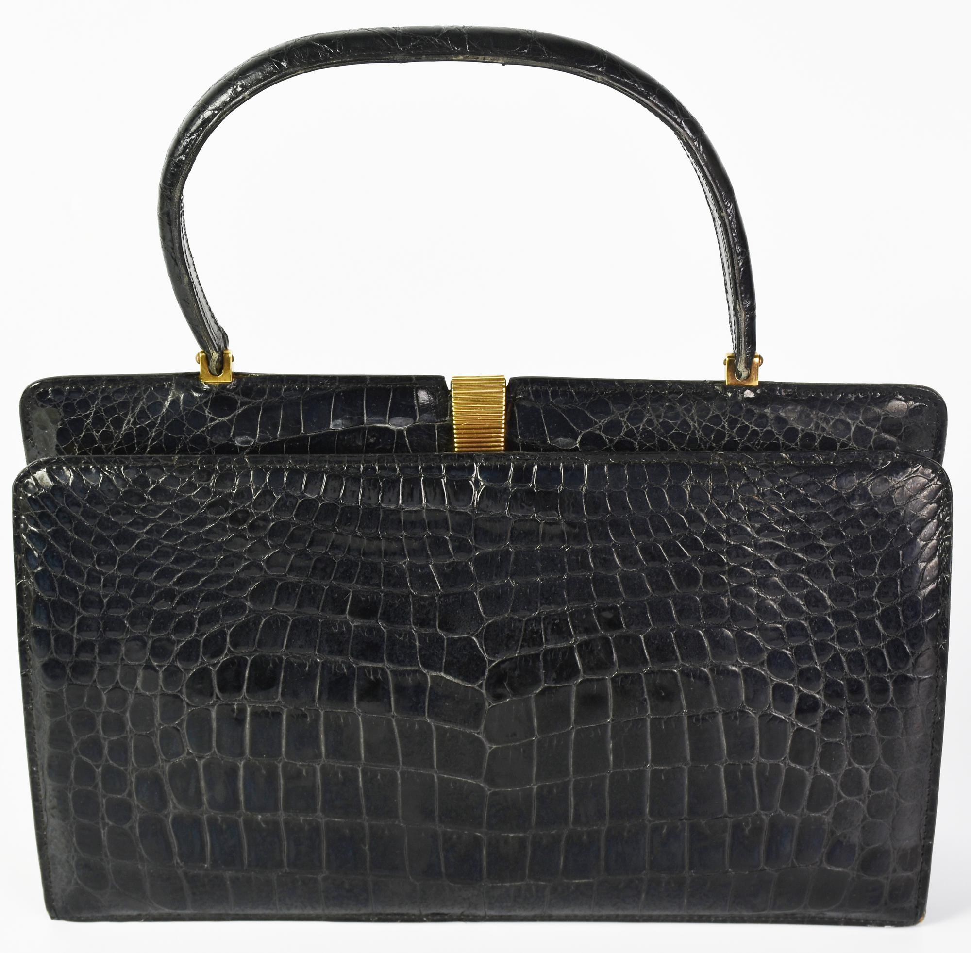 VINTAGE CROCODILE HANDBAG DESCRIPTION: Black crocodile leather handbag with...