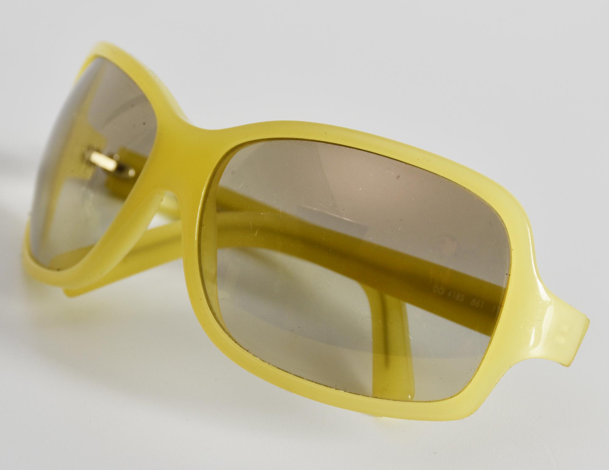 Dolce&Gabbana SUNGLASSES DESCRIPTION: Sunglasses with light green plastic...