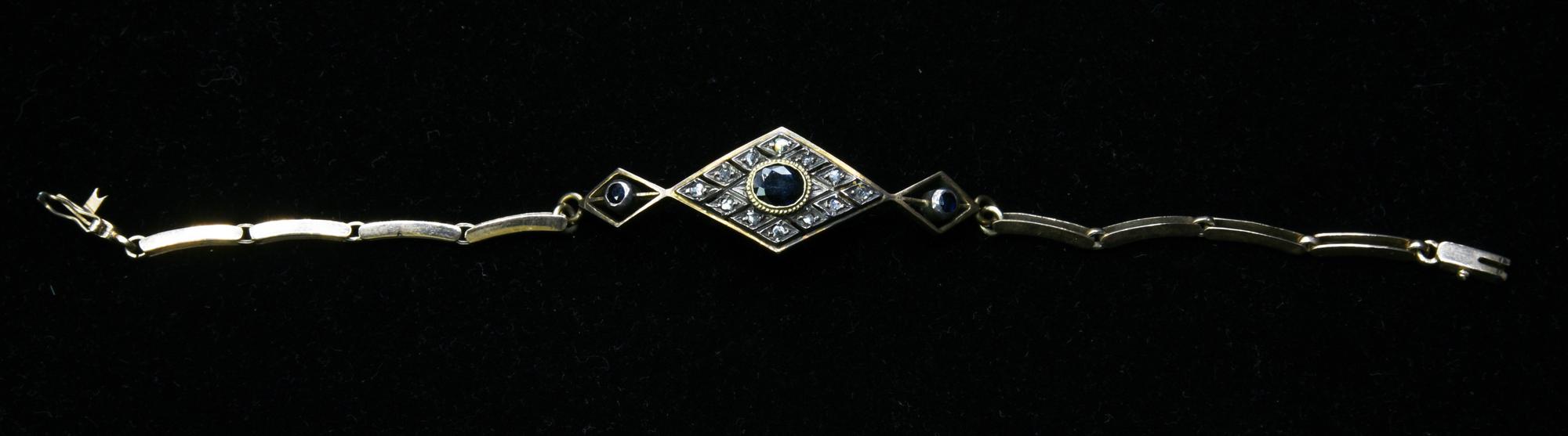 BRACCIALE IN ORO A BASSO TITOLO, ARGENTO, DIAMANTI E ZAFFIRI...