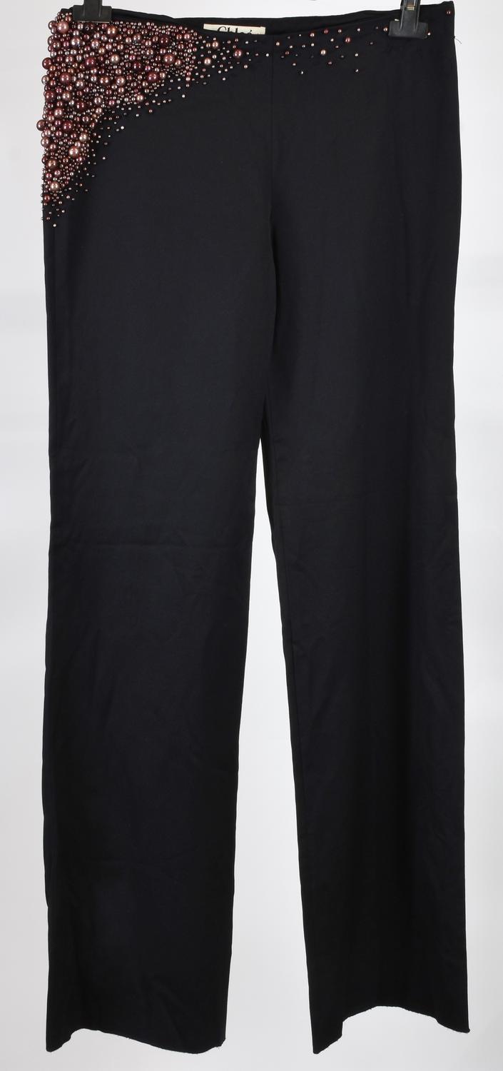 Chloe’ TROUSSERS DESCRIPTION: Trousers with small bead embellishments....