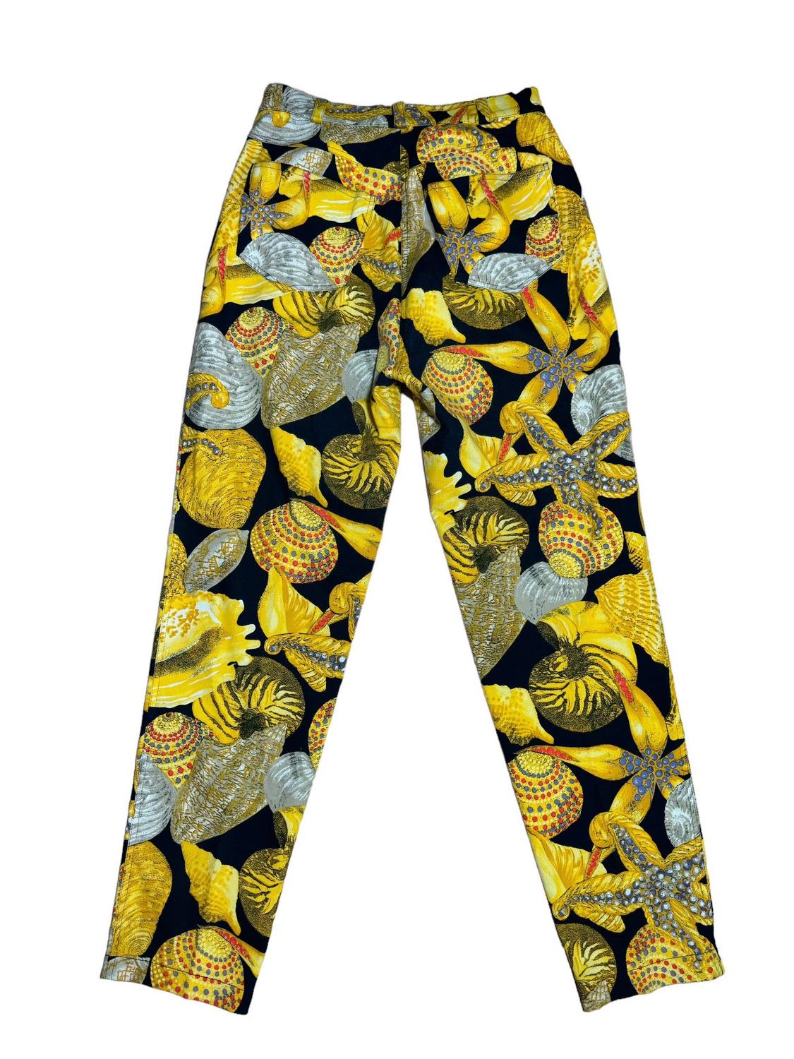 Istante By Gianni Versace TRESOR PANTS DESCRIPTION: Cotton pants with a shell...