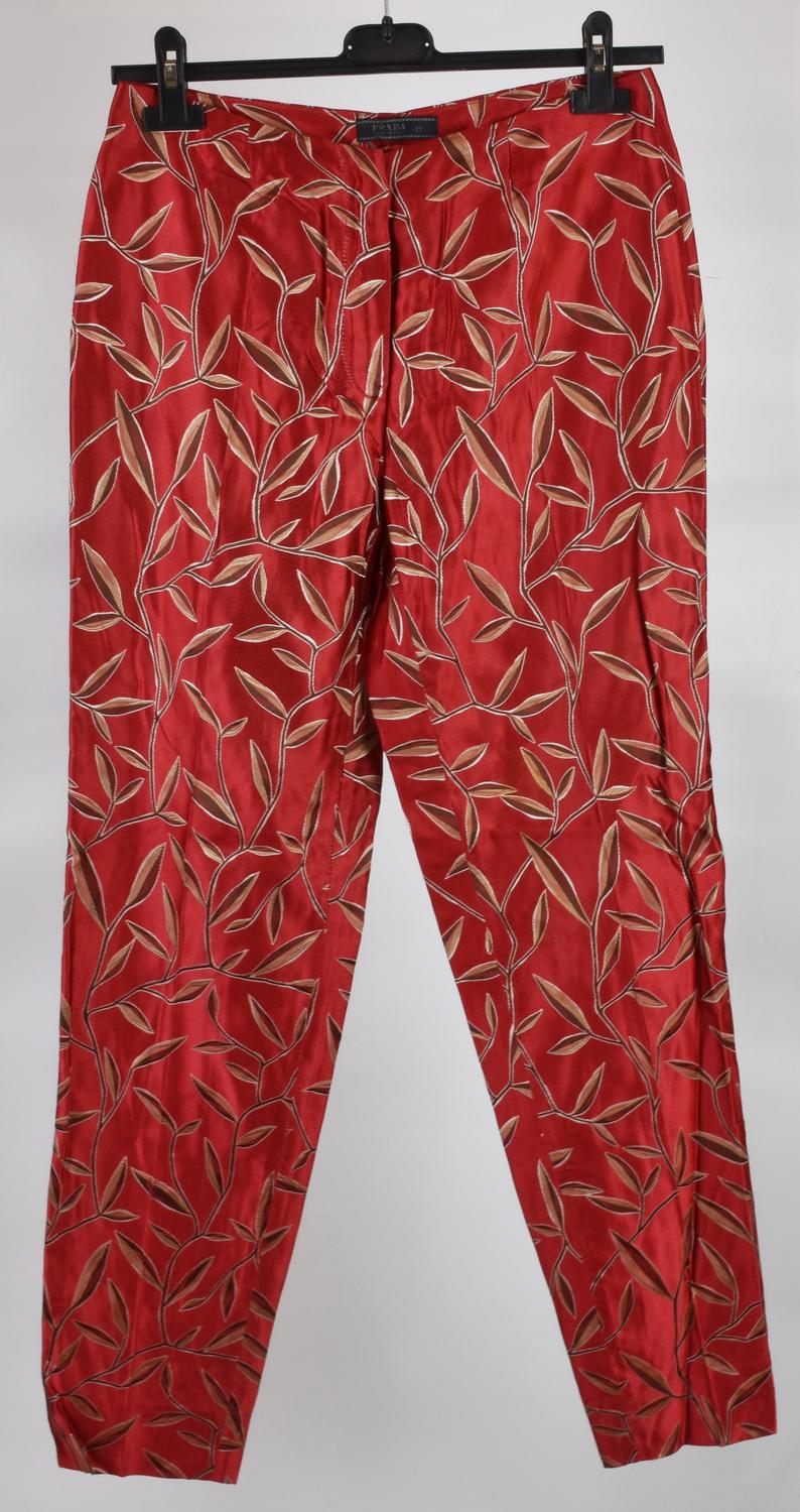 Prada SILK TROUSERS DESCRIPTION: Silk pants with floral decorations inspired...