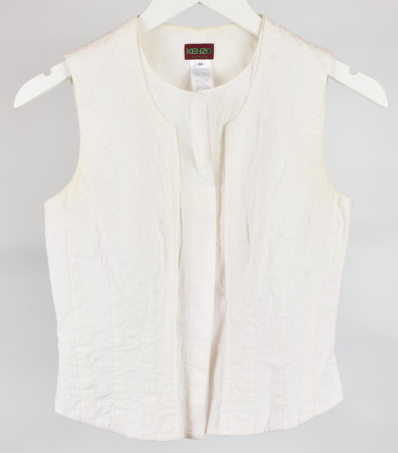 Kenzo TOP DESCRIPTION: White sleeveless top with tone-on-tone embroidery....