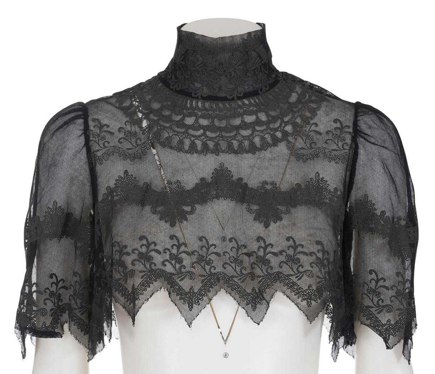 Jean Paul Gaultier ICONIC LACE CROP SHAWL DESCRIPTION: Iconic lace crop shawl...