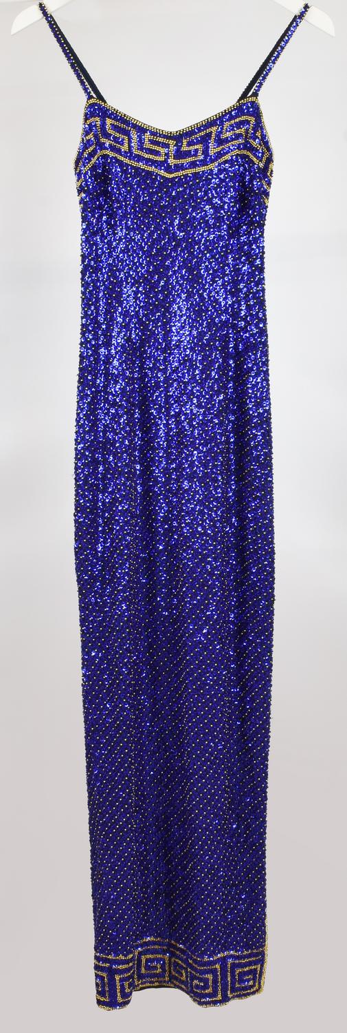 SEQUINS DRESS DESCRIPTION: Dress with blue and gold sequins hand-applied as...