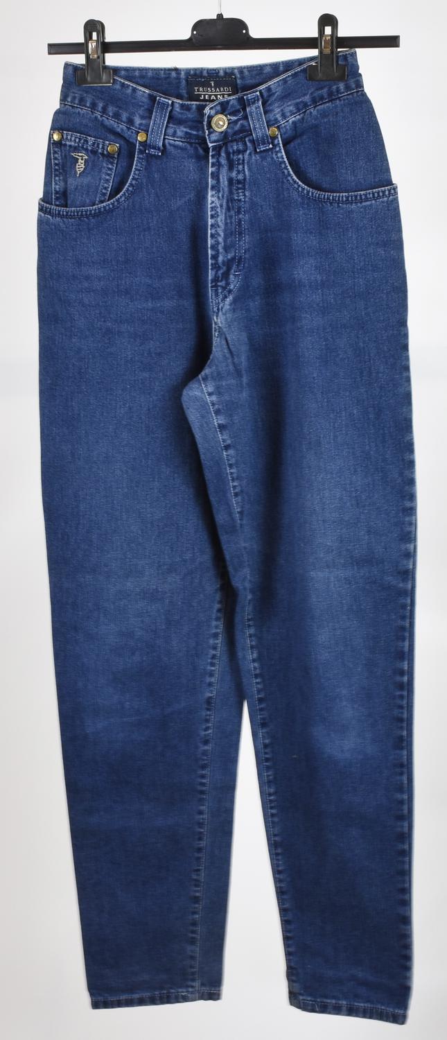 Trussardi JEANS DESCRIPTION: Five-pocket jeans with metallic logo on the...