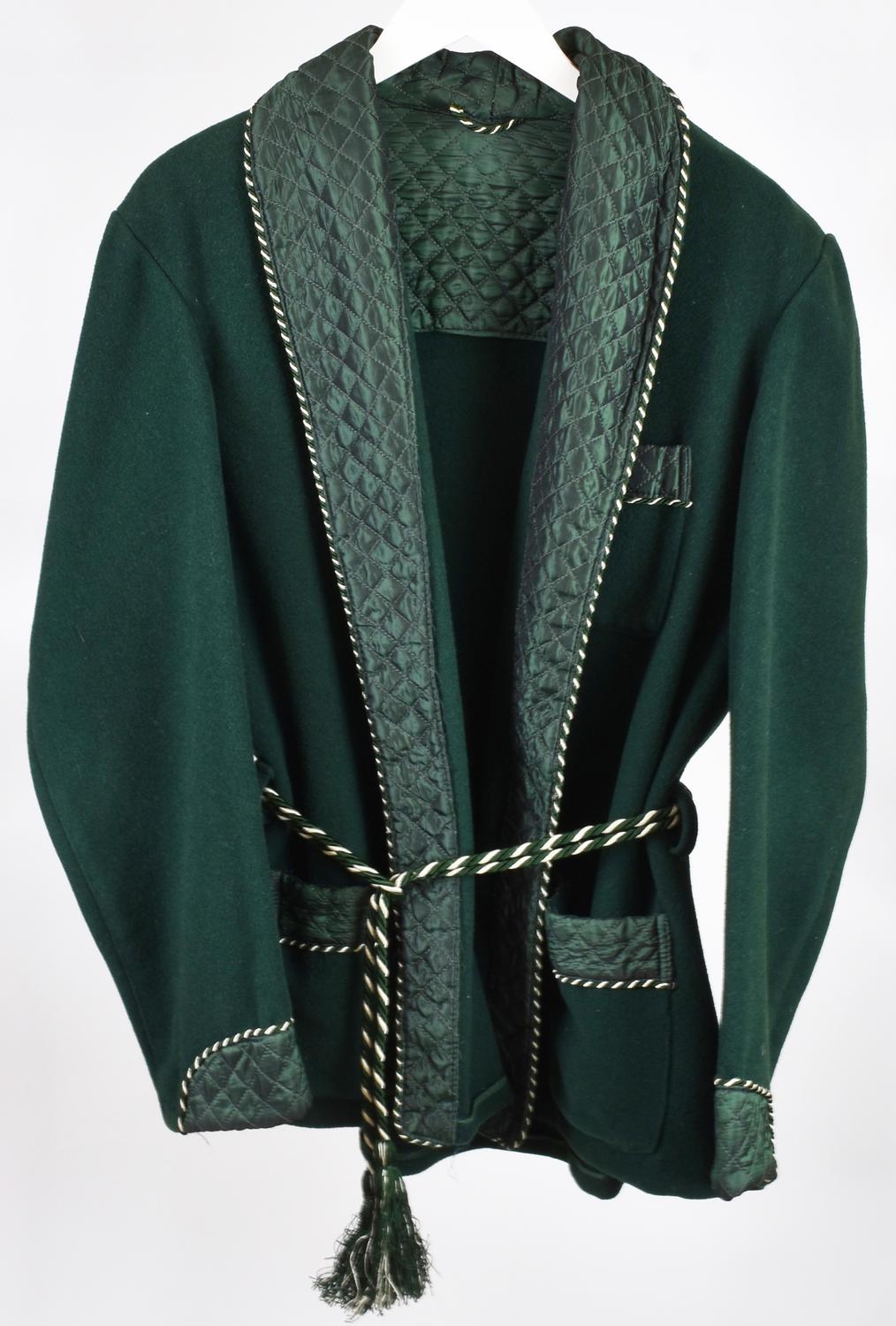 SMOKING JACKET DESCRIPTION: Green wool smoking jacket with quilted inserts....