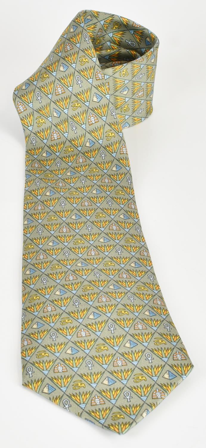 Hermes SILK TIE DESCRIPTION: Silk tie with an Egyptian-style pattern. Code:...