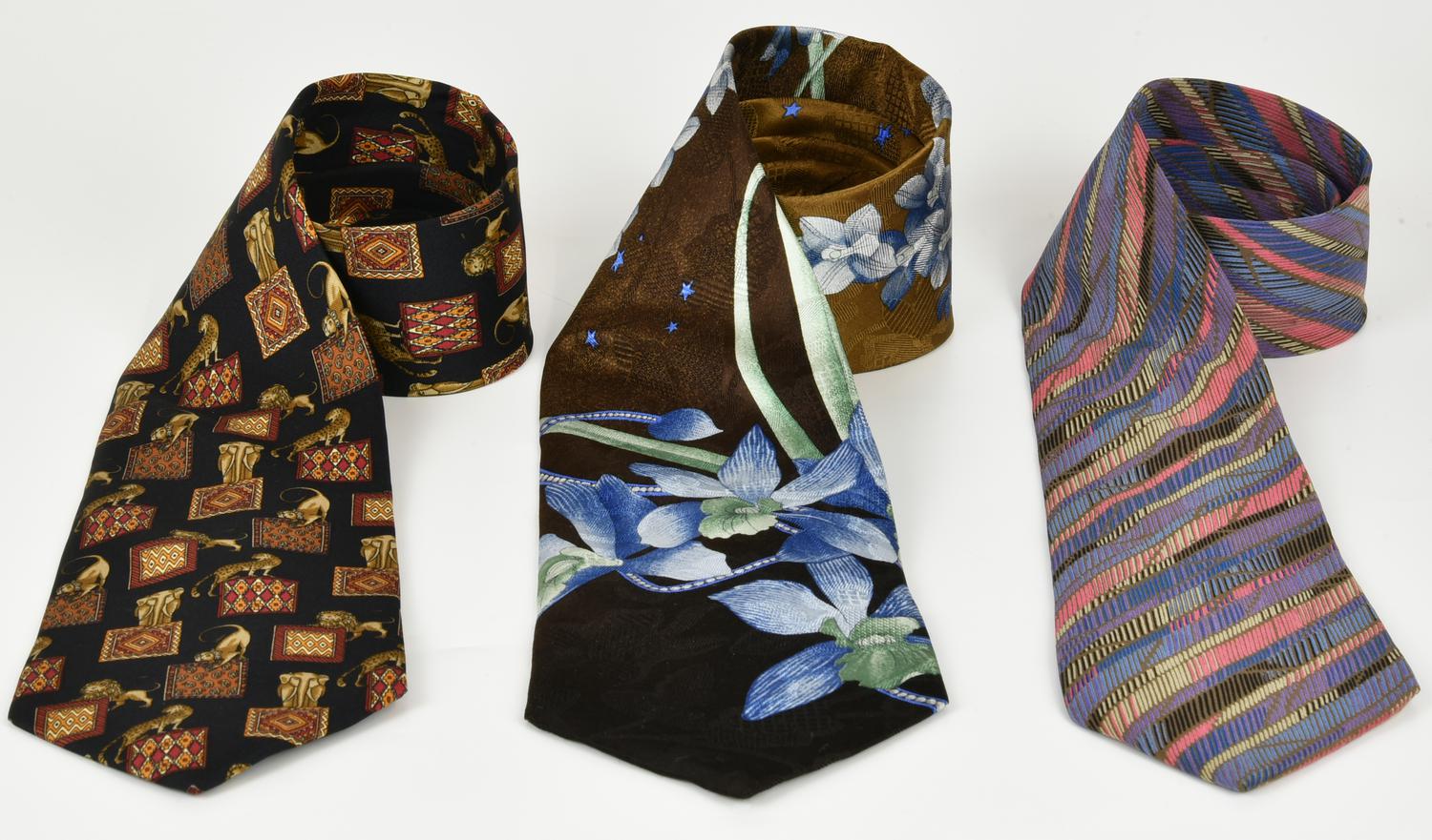 SET OF THREE SILK TIES DESCRIPTION: SALVATORE FERRAGAMO Silk Tie. Made in...