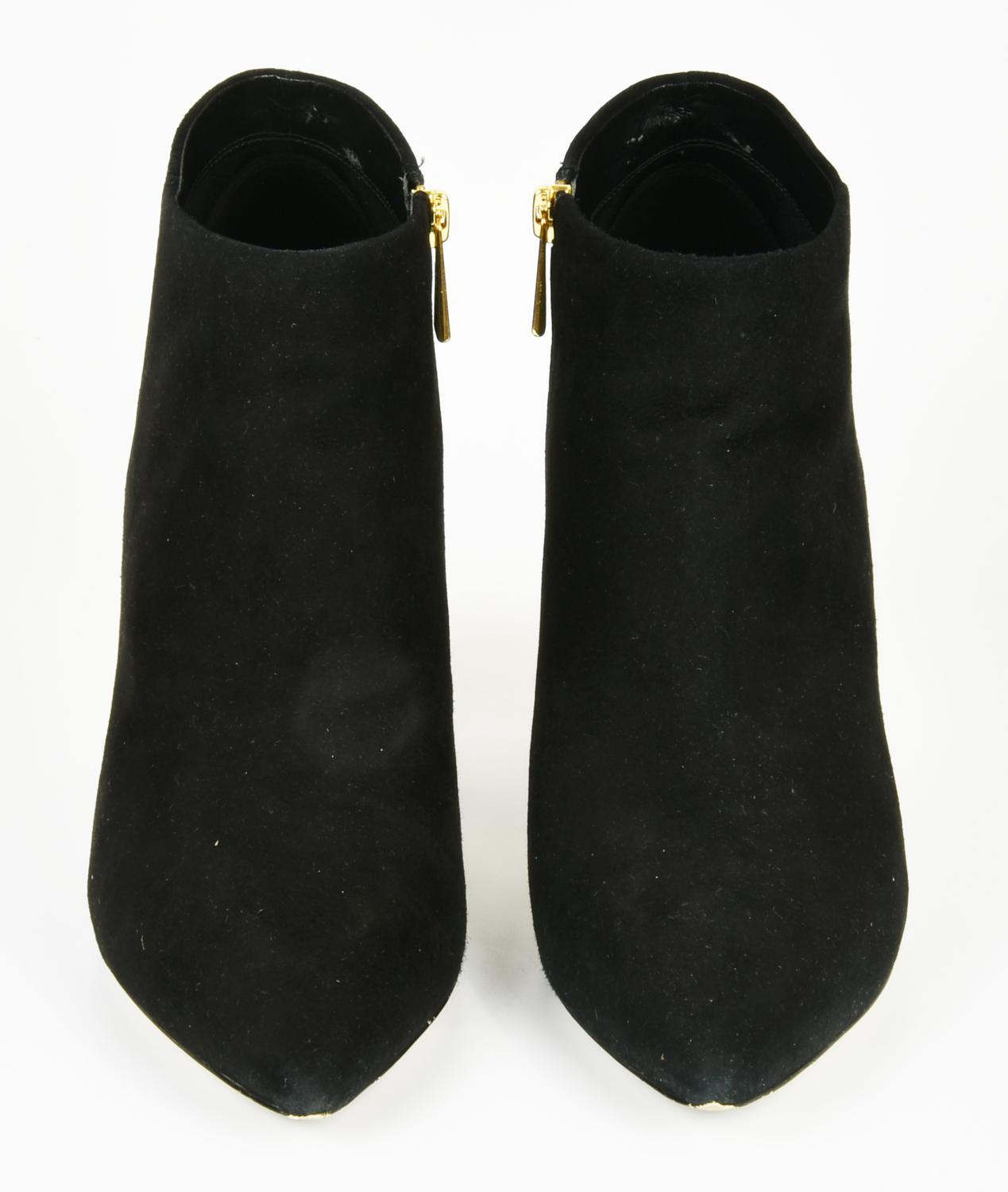 Micheal Kors ANKLE BOOTS DESCRIPTION: Black suede ankle boots with a wide...