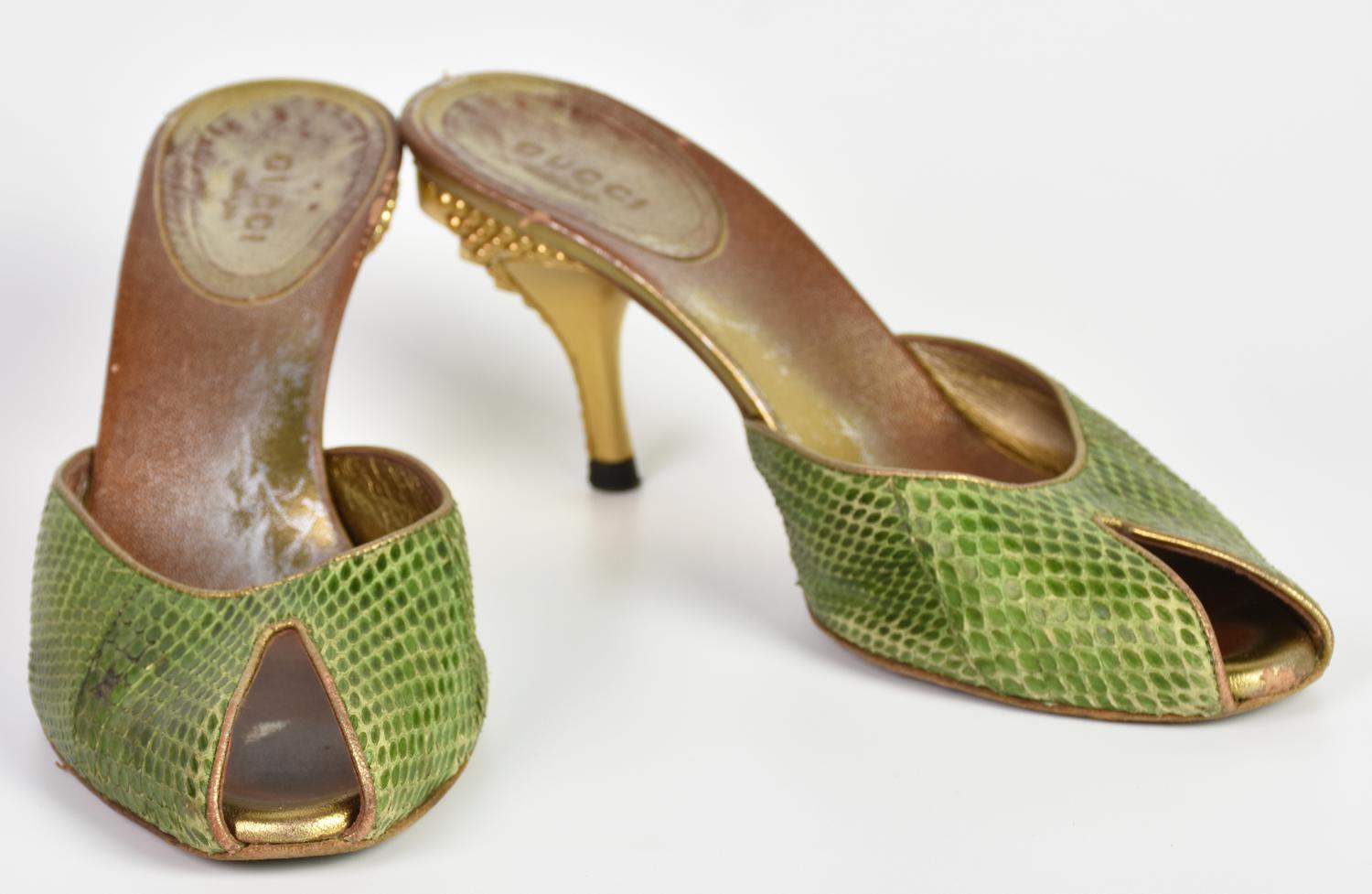 Gucci PHYTON SANDALS DESCRIPTION: Open-toe python sandals with gold sculpted...