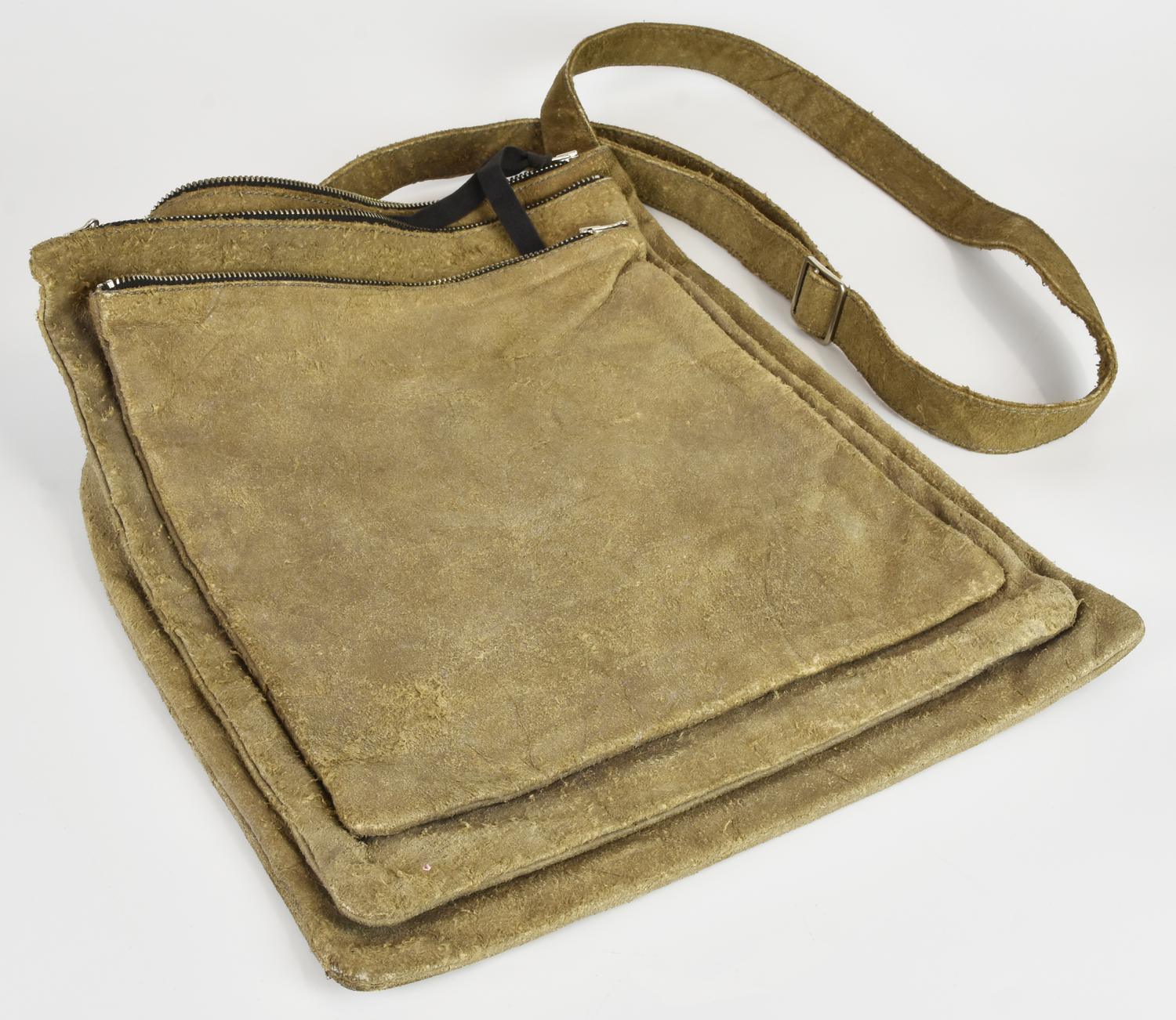 Martin Margiela SHOULDER BAG DESCRIPTION: Shoulder bag in worn-effect...