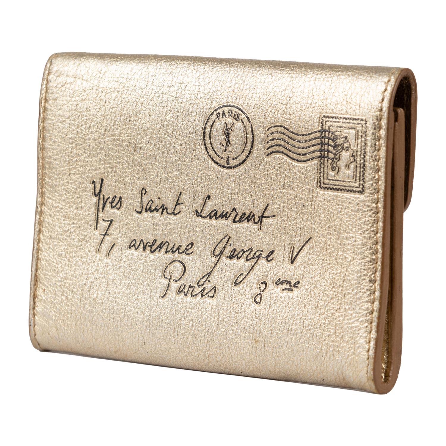 Yves Saint Laurent LEATHER CARD HOLDER DESCRIPTION: This Yves Saint Laurent...