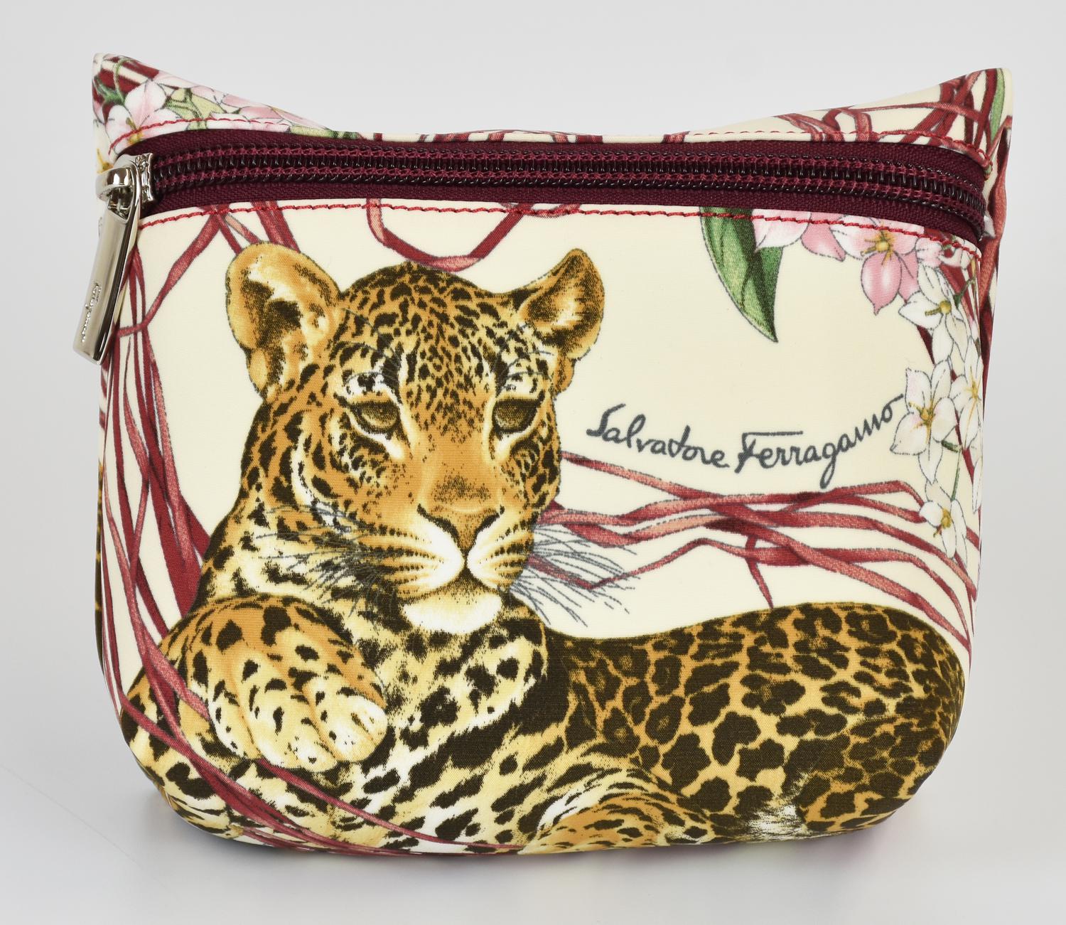 Salvatore Ferragamo TROUSSE DESCRIPTION: Small pouch in printed fabric with a...