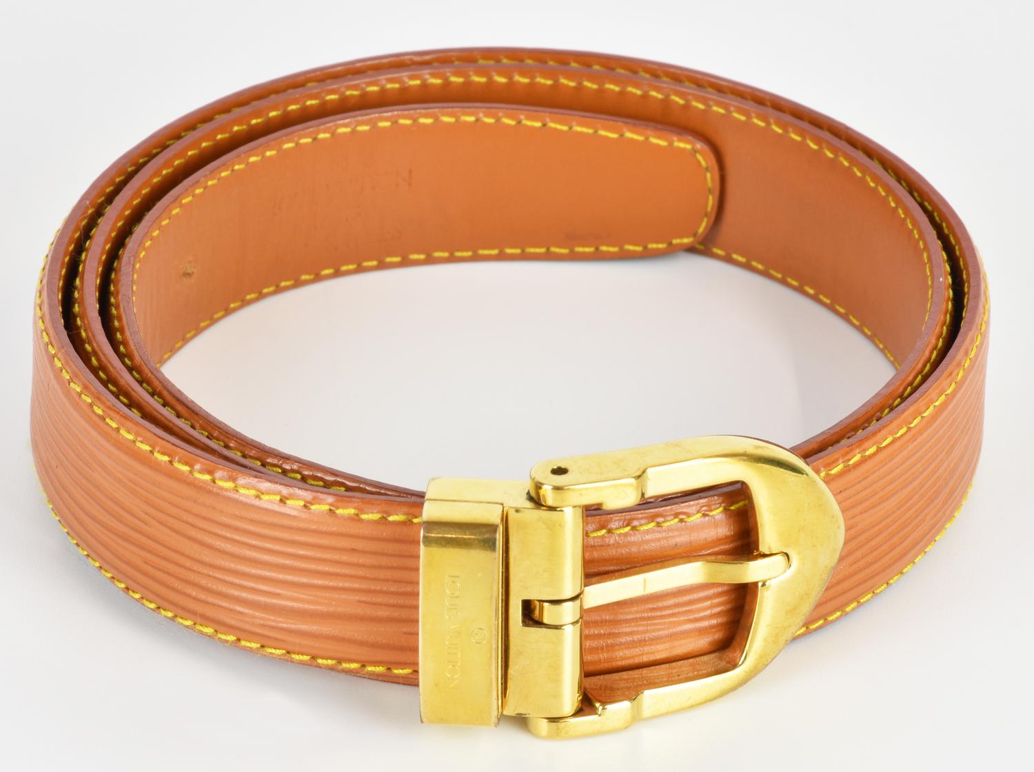 Louis Vuitton LEATHER BELT DESCRIPTION: Brown EPI leather belt. Gold-colored...